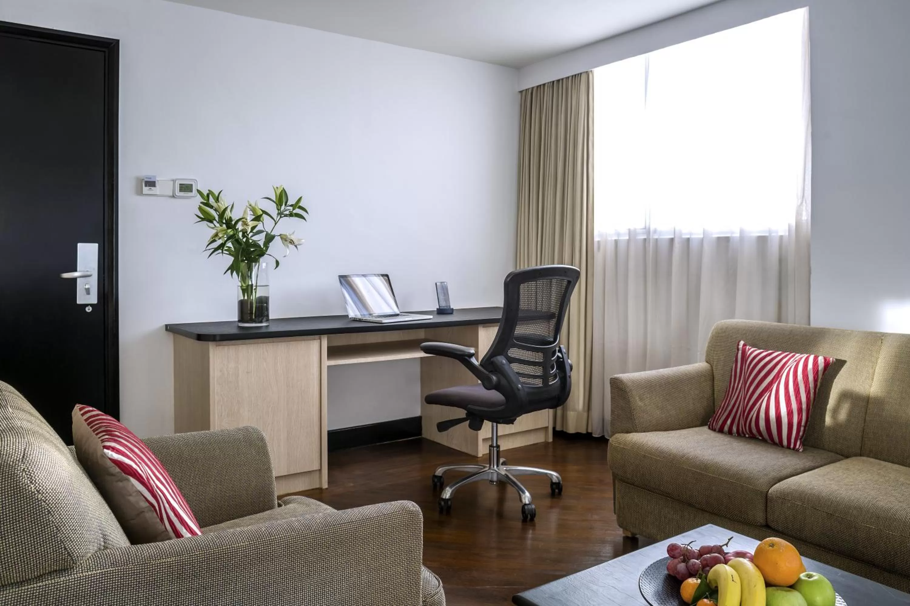 Living room in Furama RiverFront