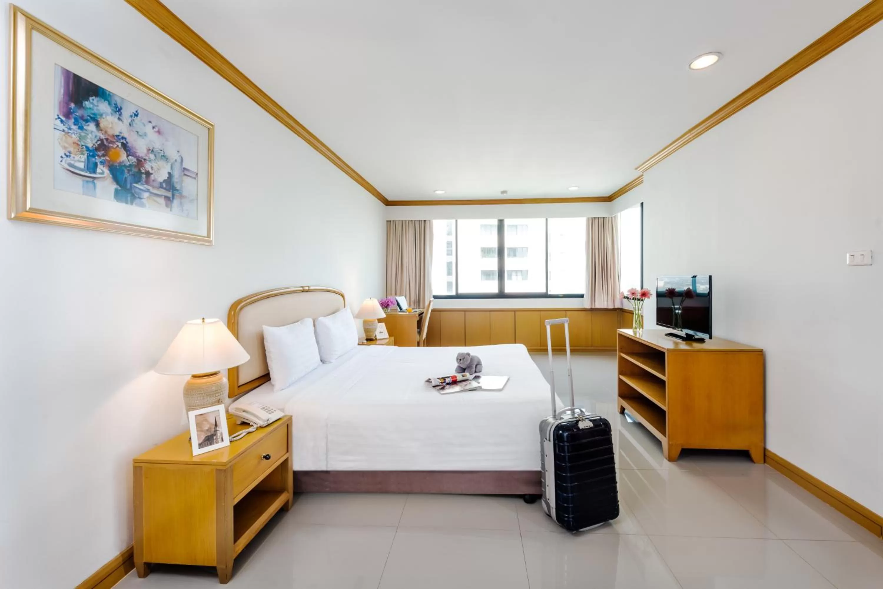Bed in Riverine Place Hotel and Residence