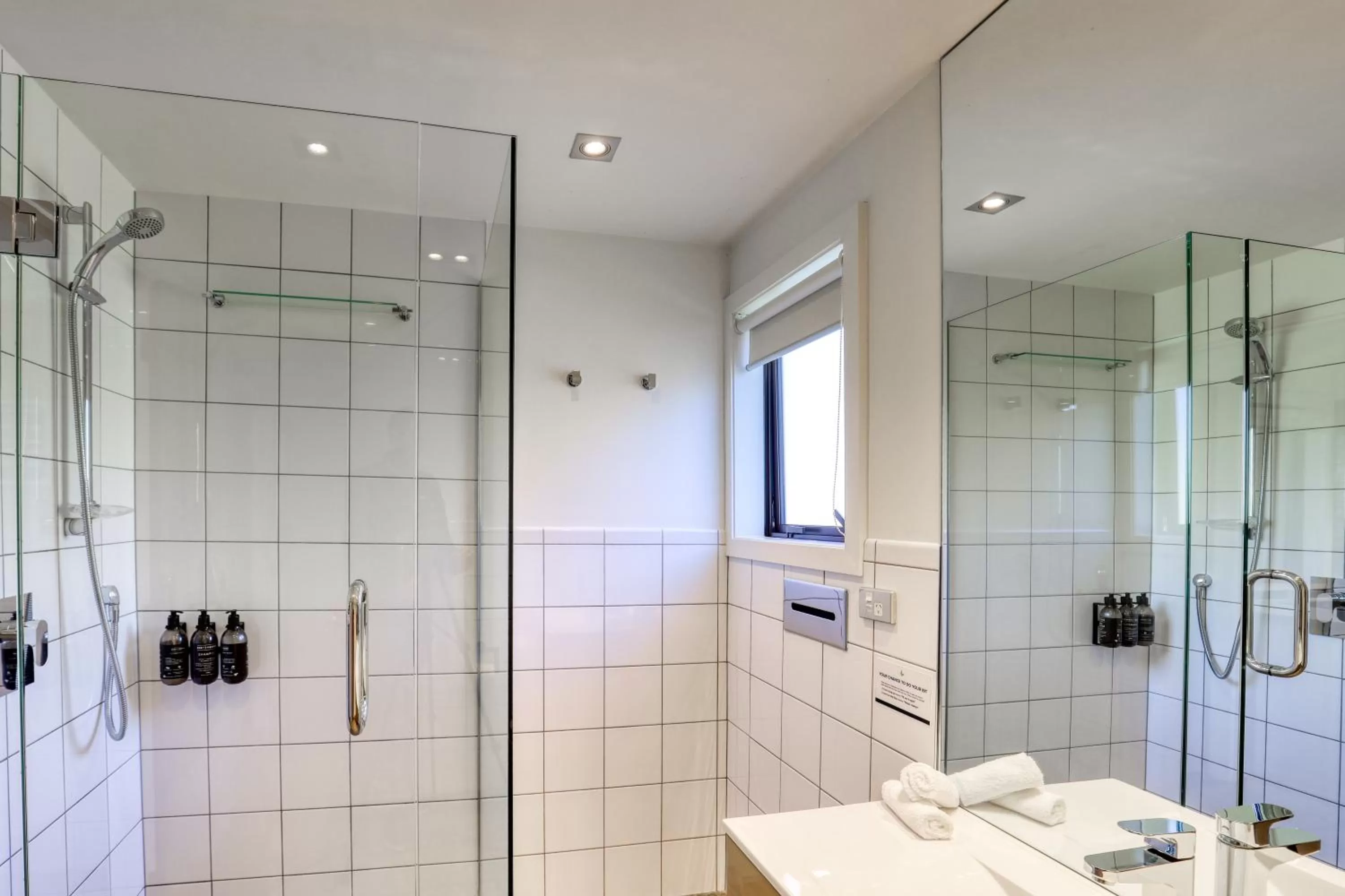 Bathroom in Garden Court Suites & Apartments