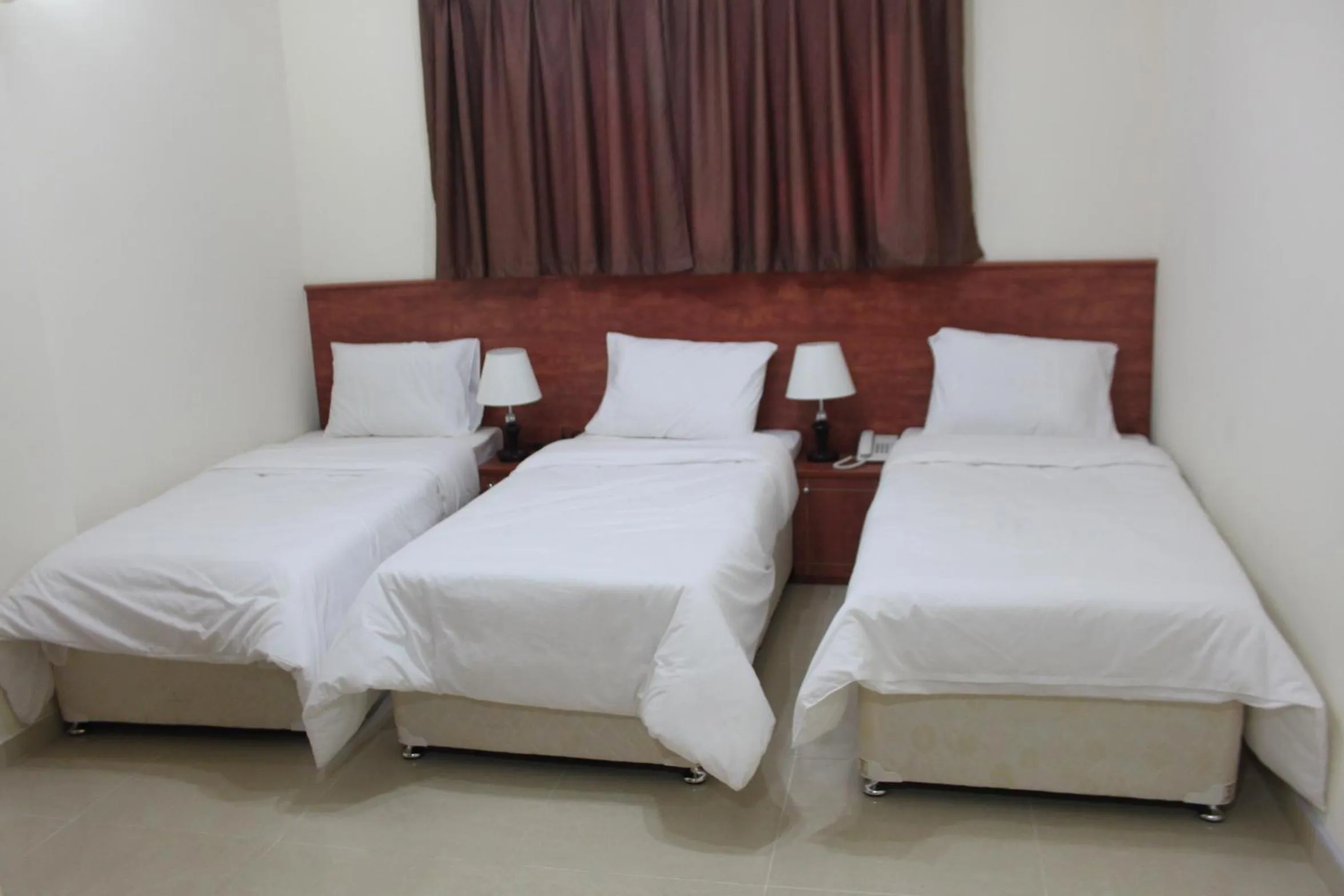 Bed in Africana Hotel