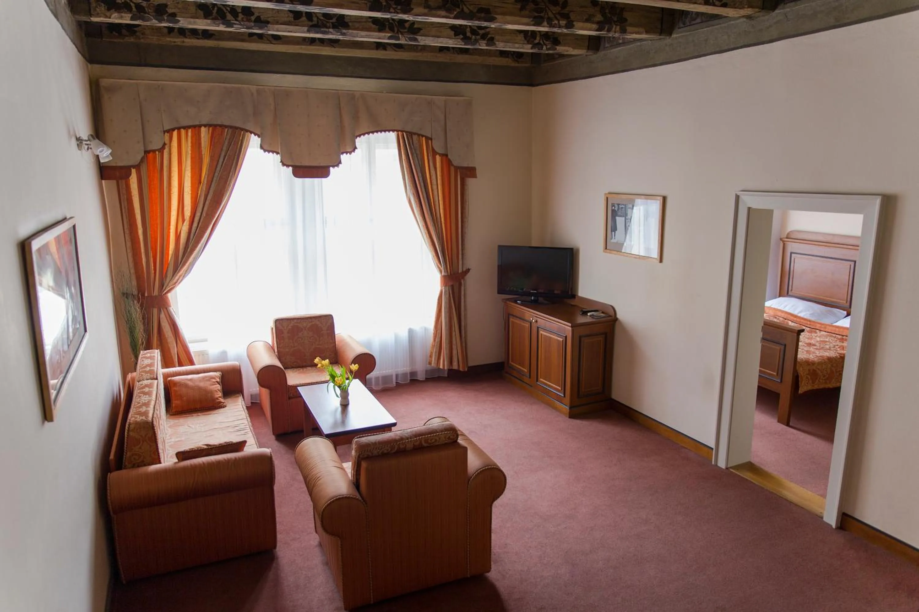 Living room, Bed in U Medvidku-Brewery Hotel