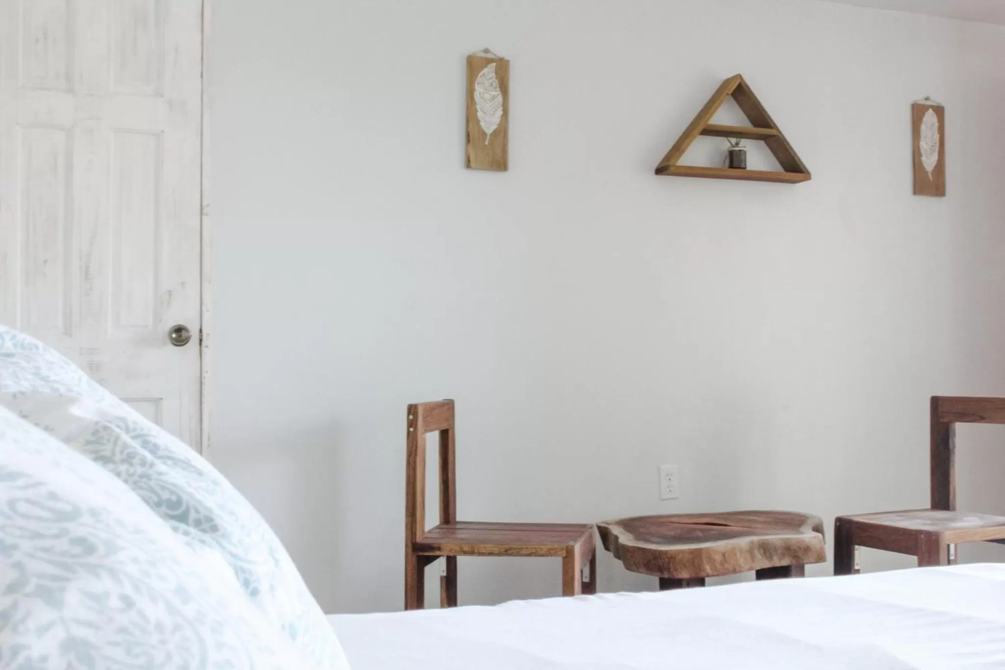 Seating area, Bed in Bird Island Bungalows