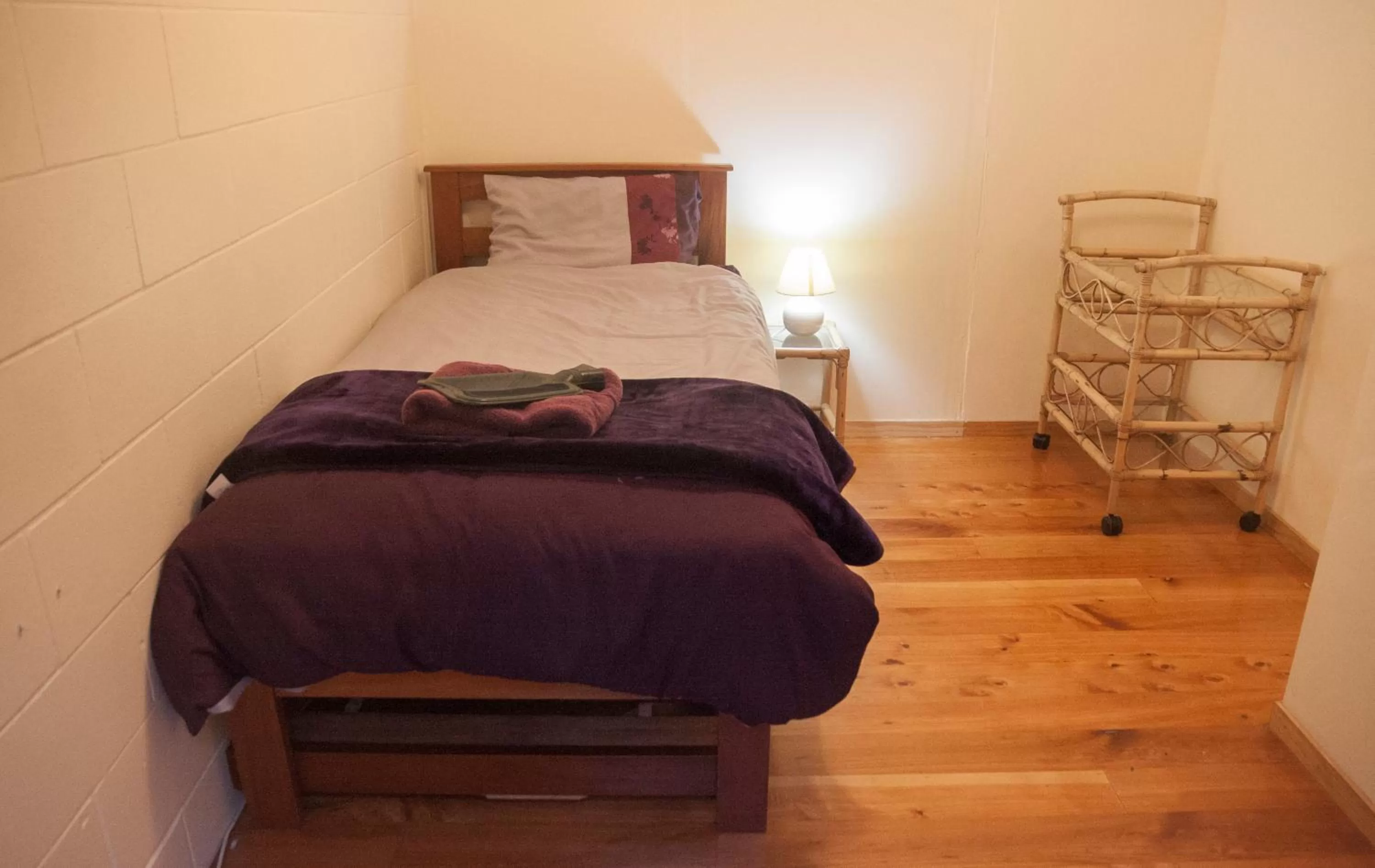 Photo of the whole room, Bed in Kawai Purapura Yoga Retreat Centre