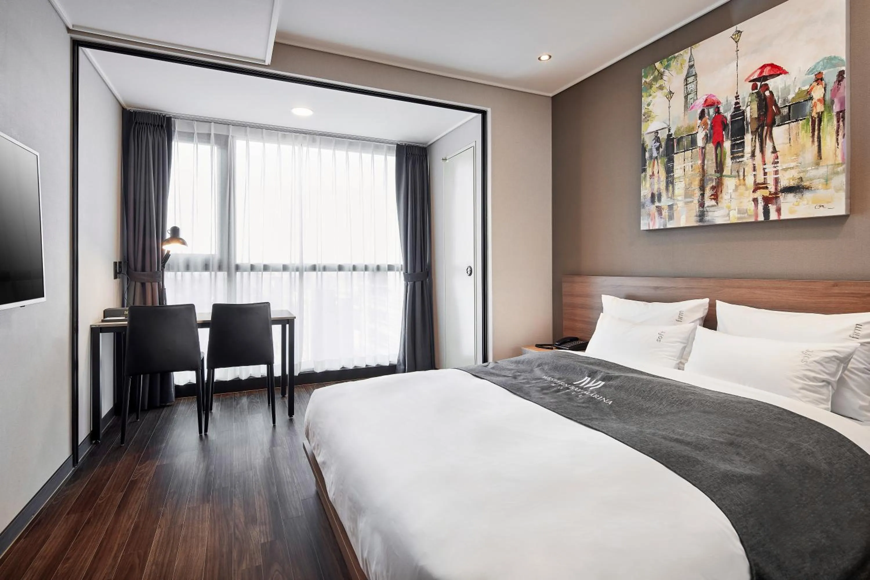 Bed in Western Bay Marina Hotel