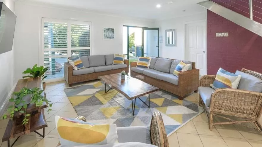 Communal lounge/ TV room in Stay At Raffertys Resort