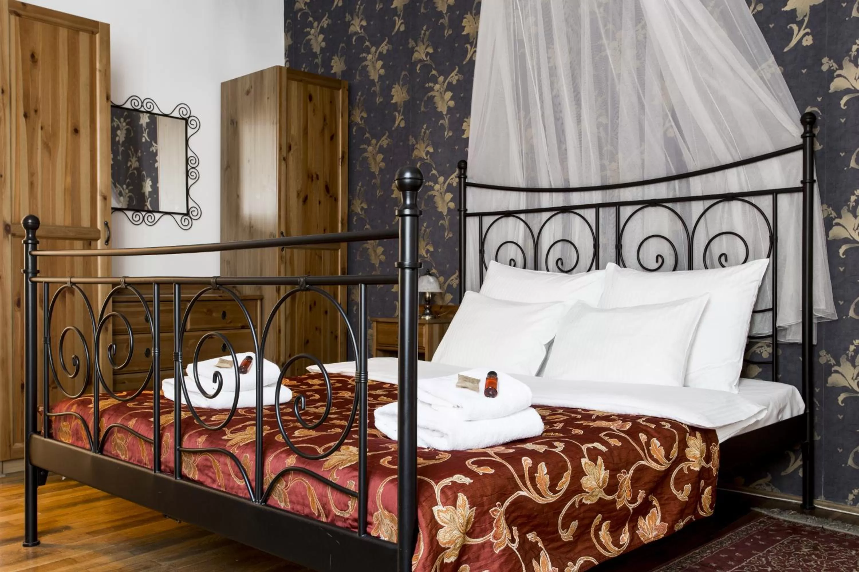 Bed in Abella Suites & Apartments by Artery Hotels