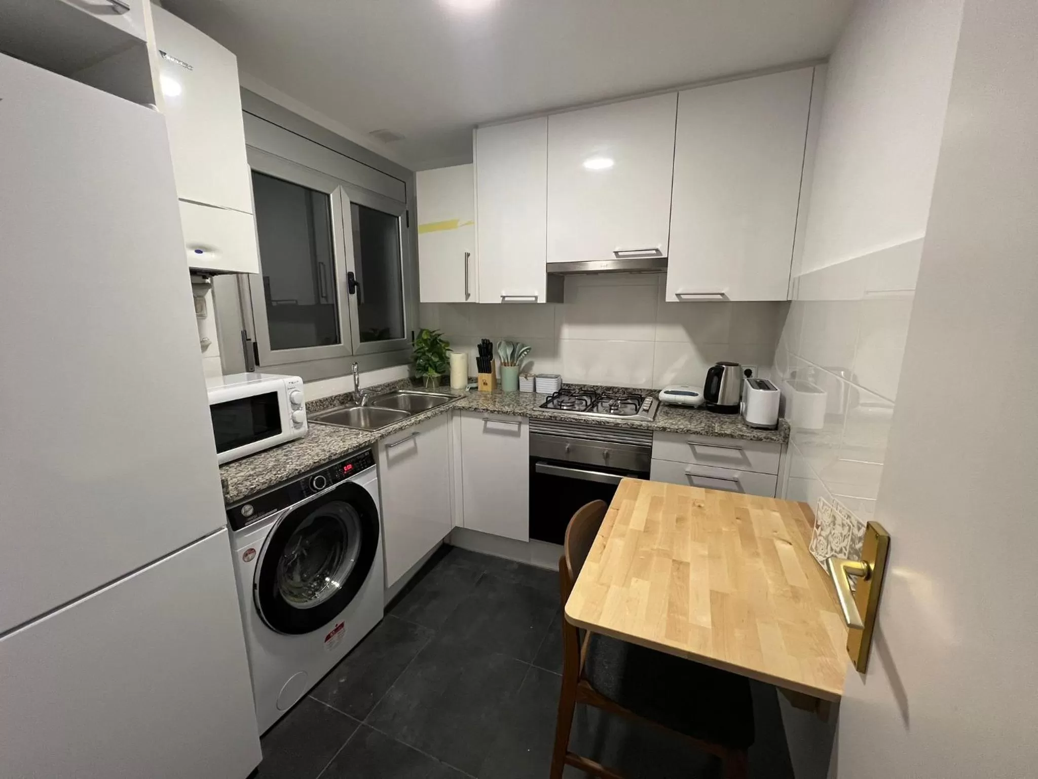 Kitchen/Kitchenette in Habitaciones Rambla Catalunya