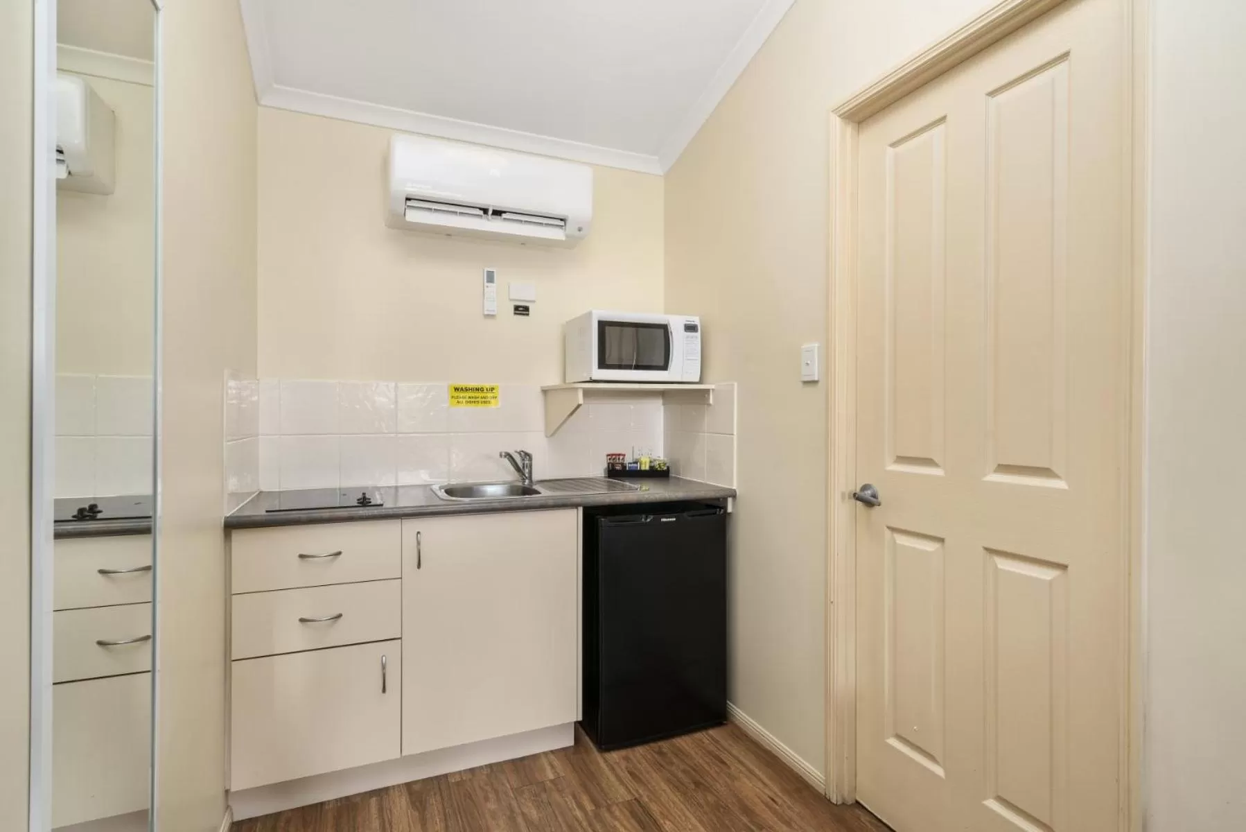 Kitchen or kitchenette in Caboolture Central Motor Inn, Sure Stay Collection by BW