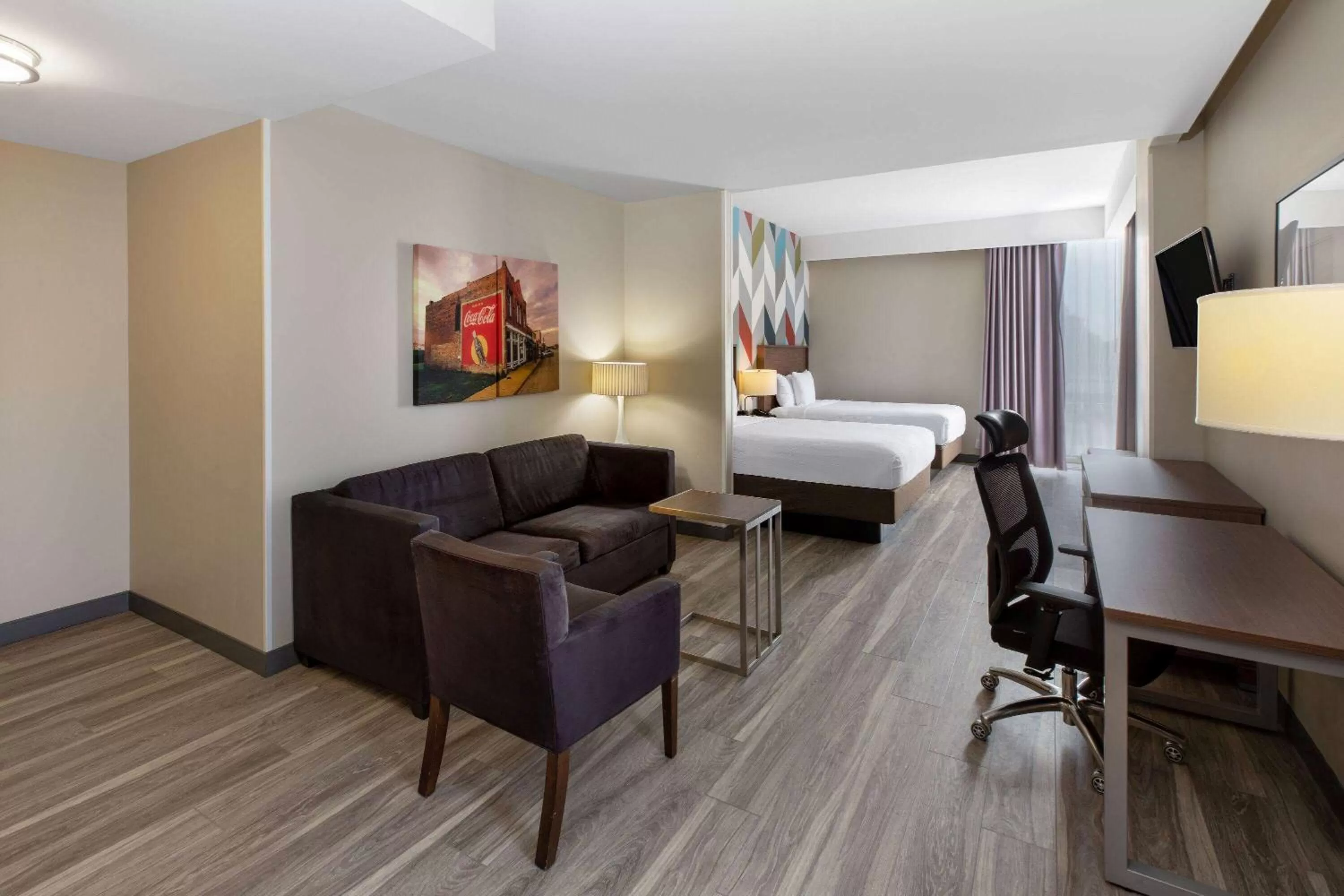 Photo of the whole room, Bed in La Quinta Inn & Suites by Wyndham Tulsa Downtown - Route 66