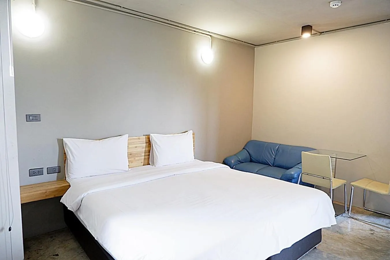 Photo of the whole room, Bed in Izen Plus Budget Hotel & Residence