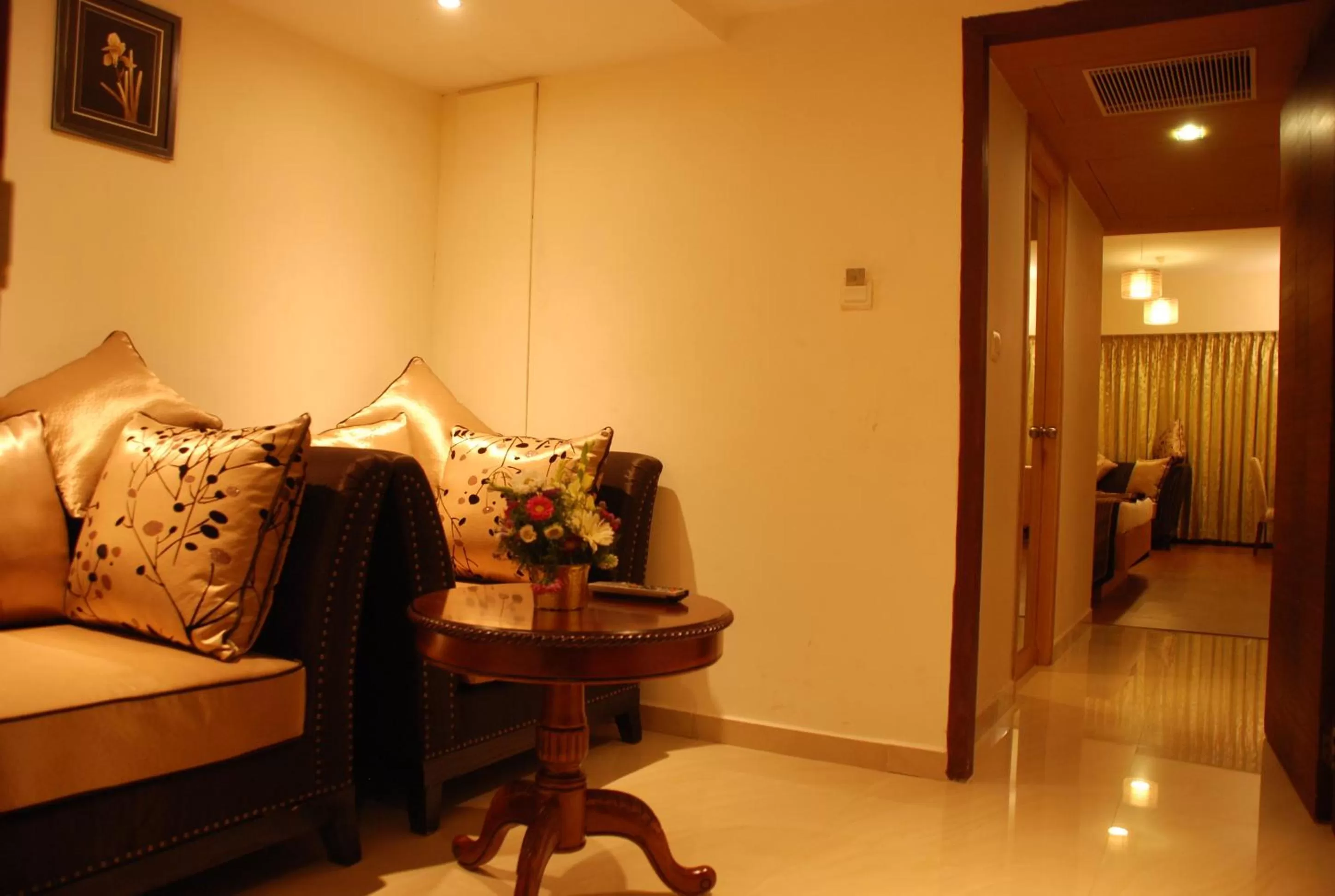 Seating area, Bed in PLA Krishna Inn