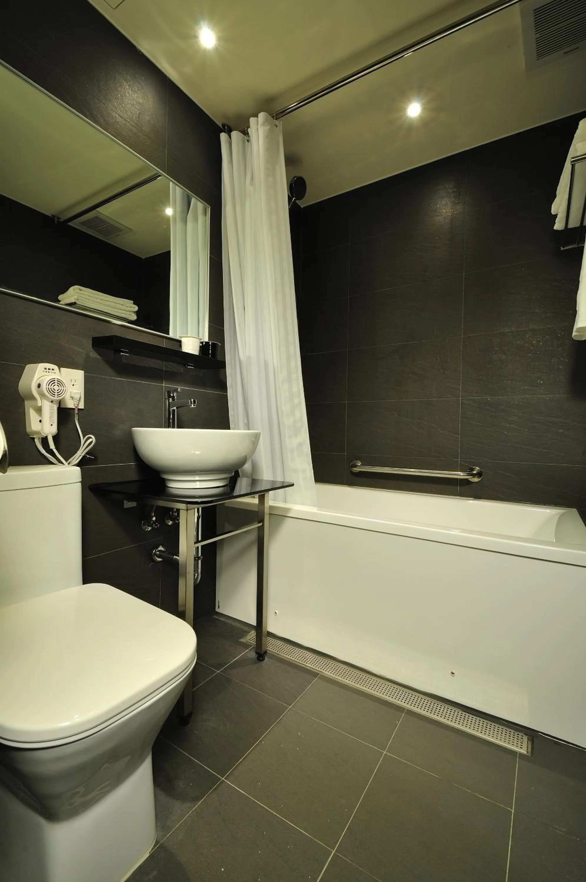 Bathroom in Forward Suites II