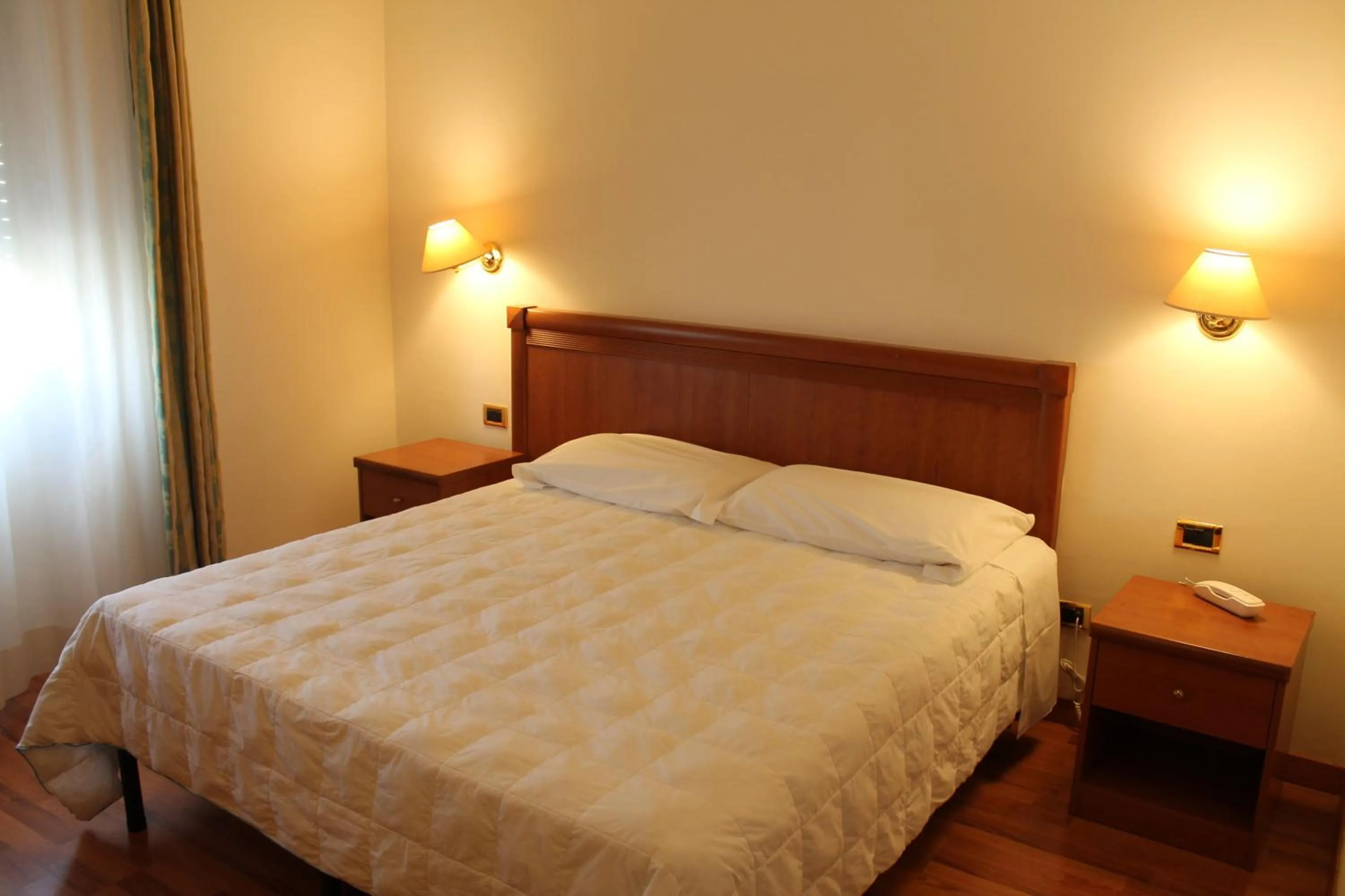 Bed in Hotel Santa Lucia