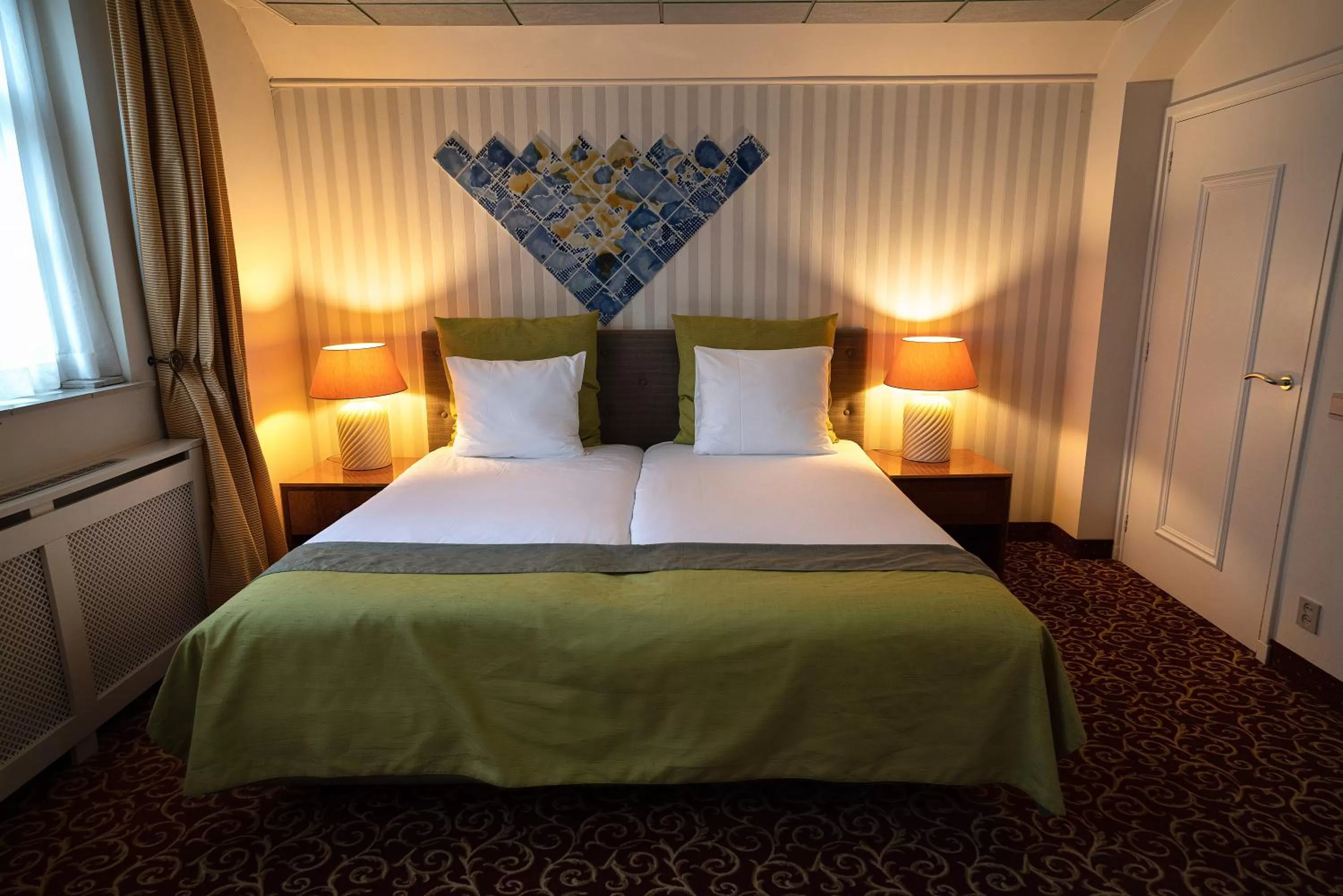 Bed in Grand Museum Hotel, BW Signature Collection