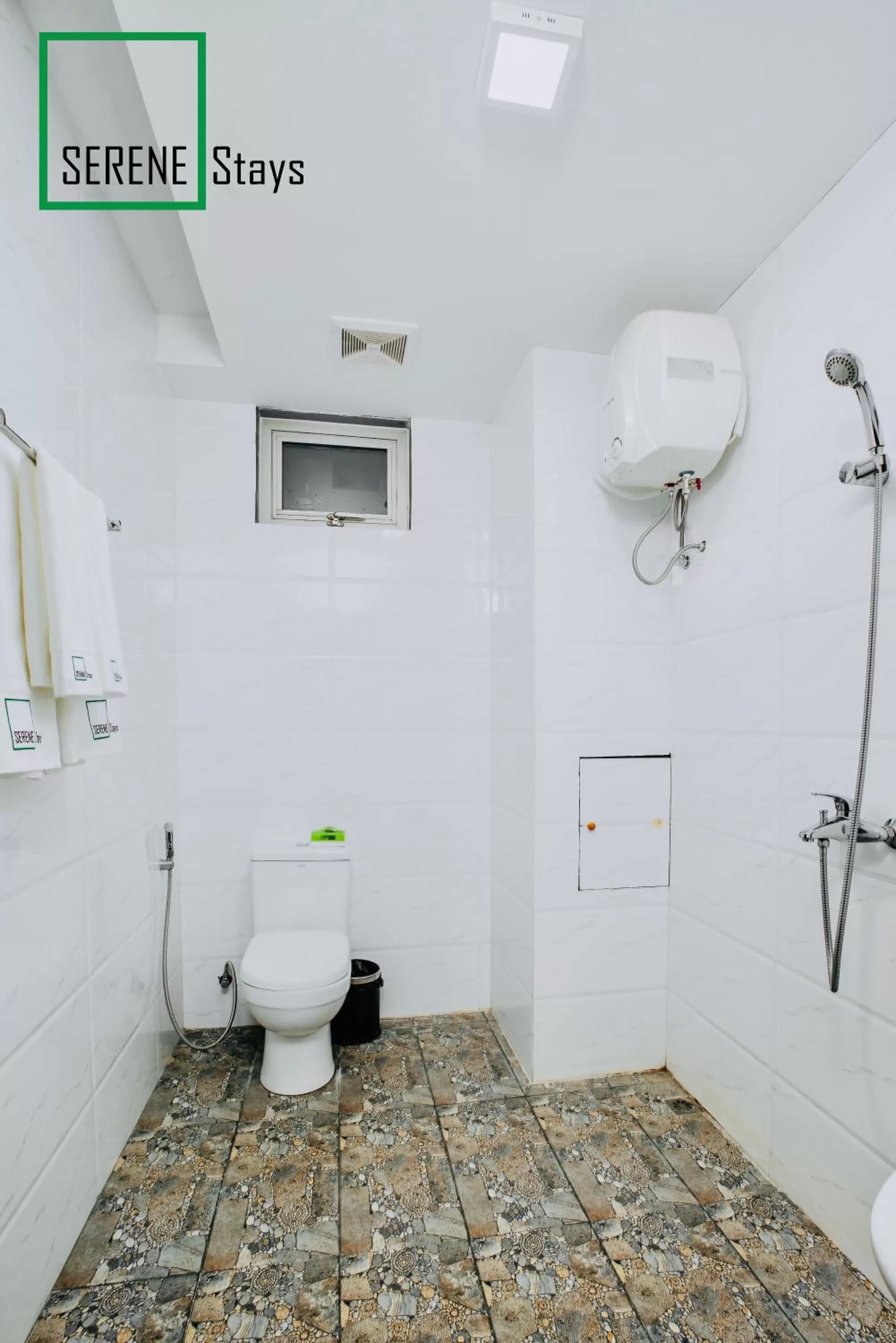 Bathroom in SERENE Stays Hotel