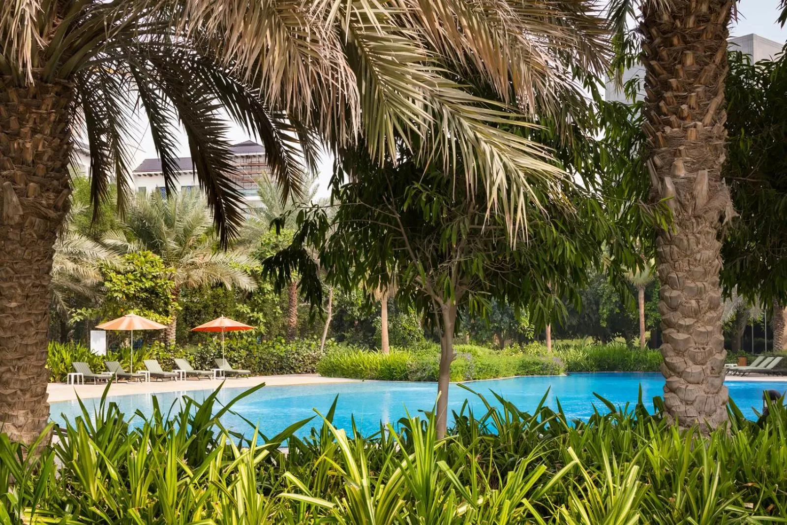 Property building, Swimming Pool in Rixos The Palm Luxury Suite Collection - Ultra All Inclusive