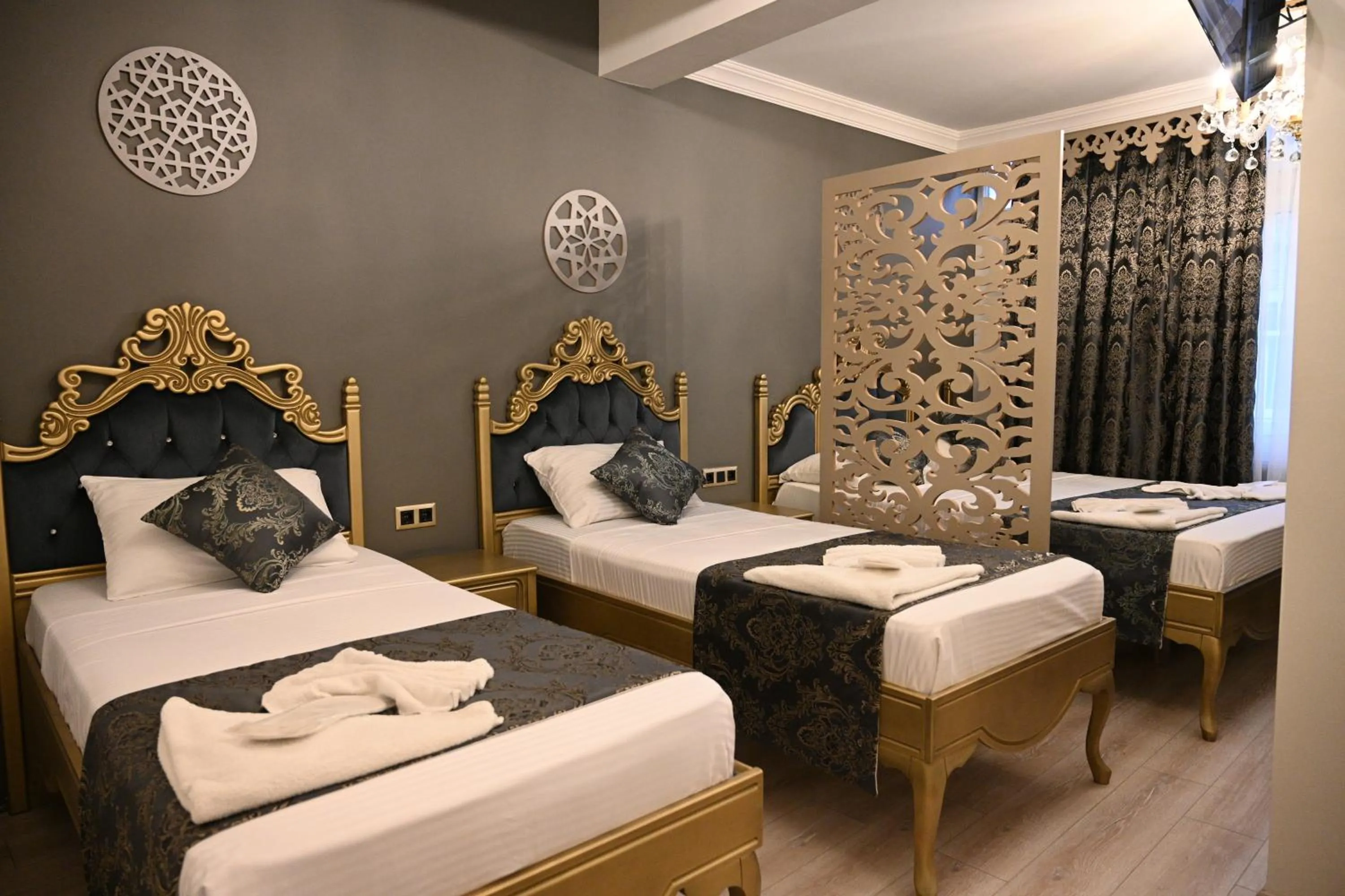 Bed in Ethnica Suites