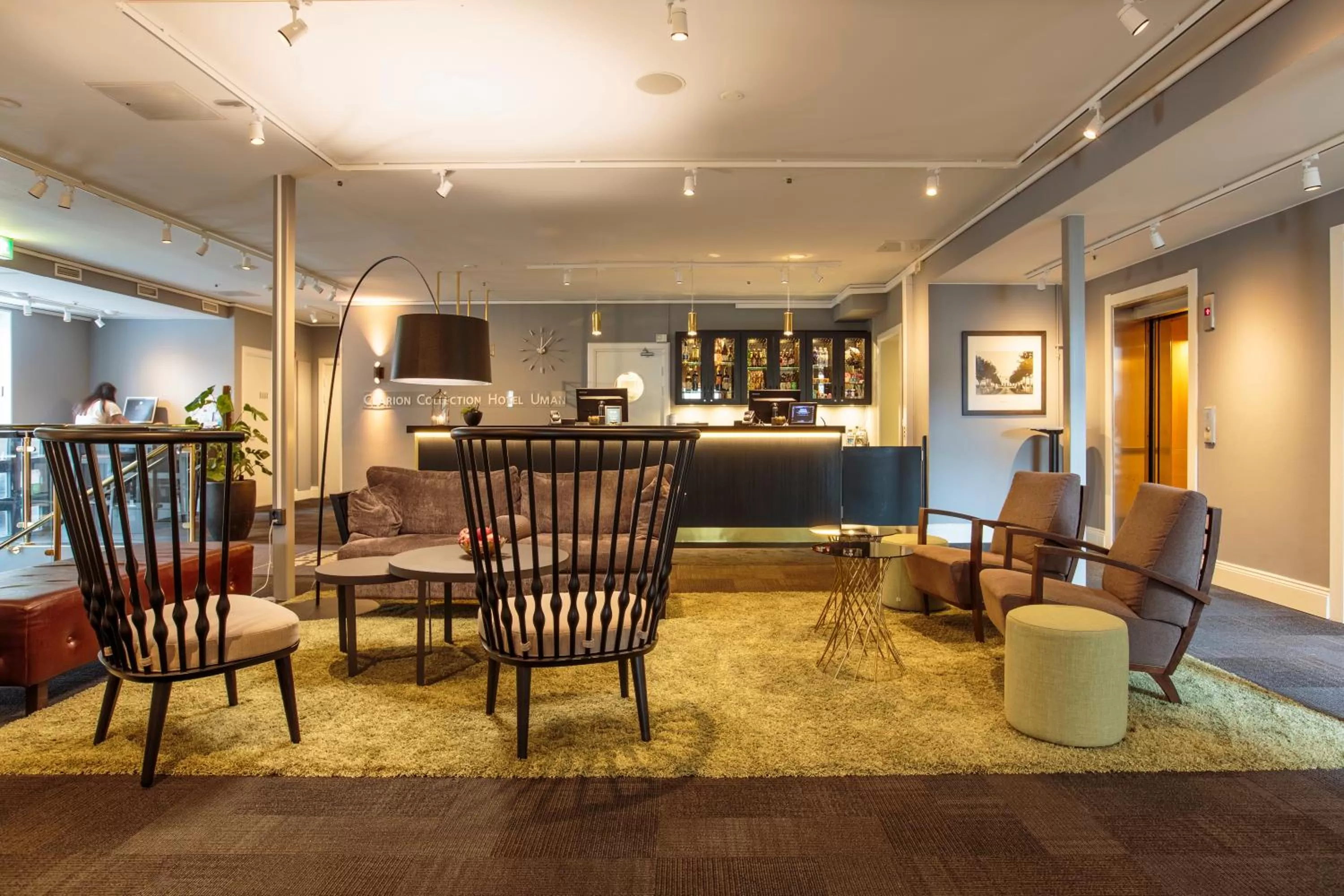 Communal lounge/ TV room in Home Hotel Uman