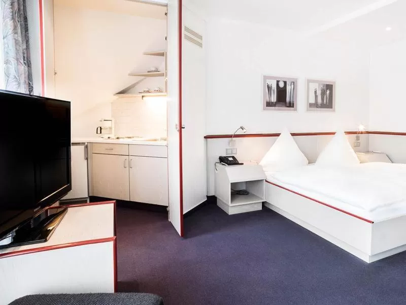 TV/Entertainment Center in Hennedamm Hotel