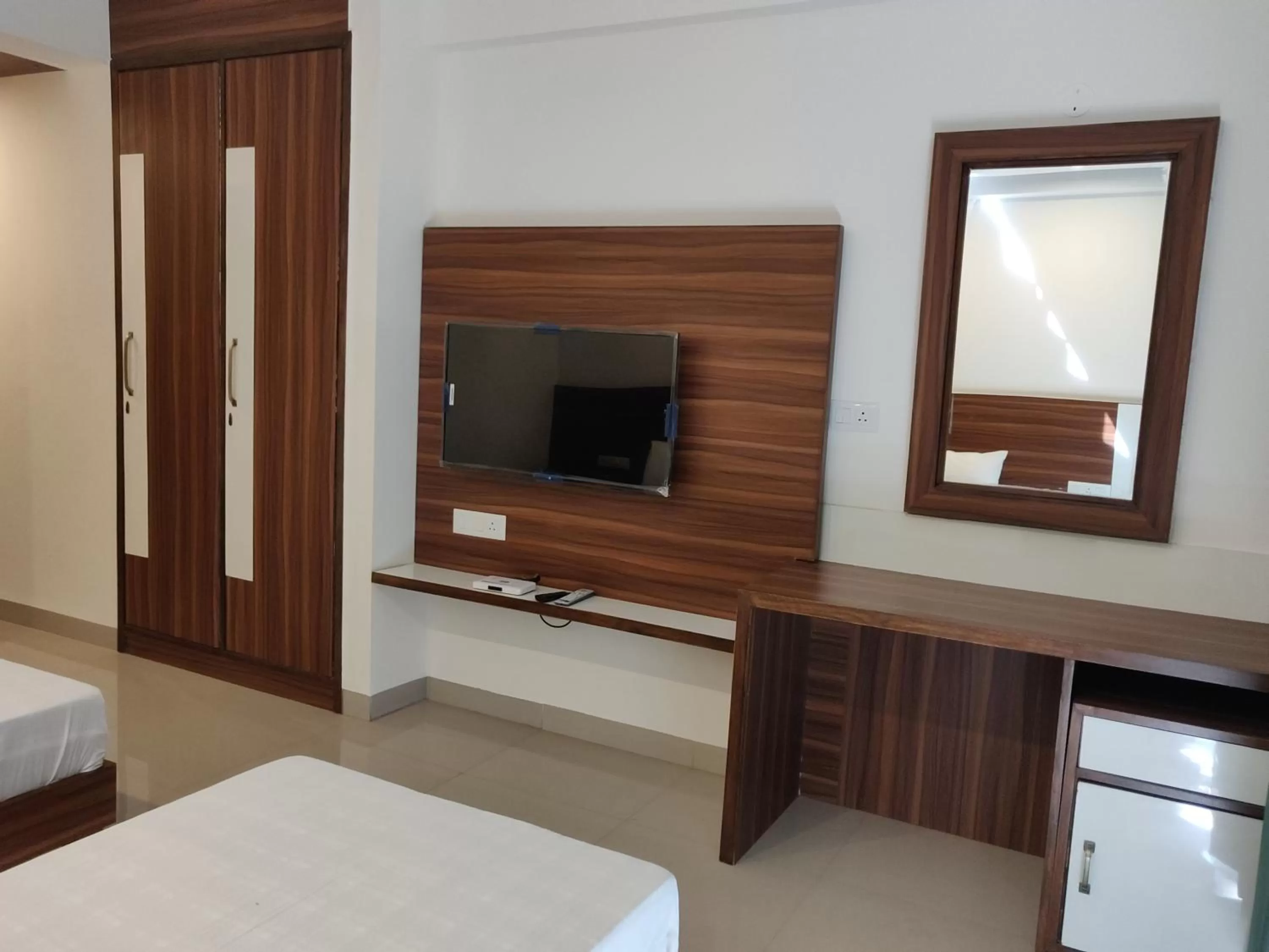 Bedroom, TV/Entertainment Center in Pride Home