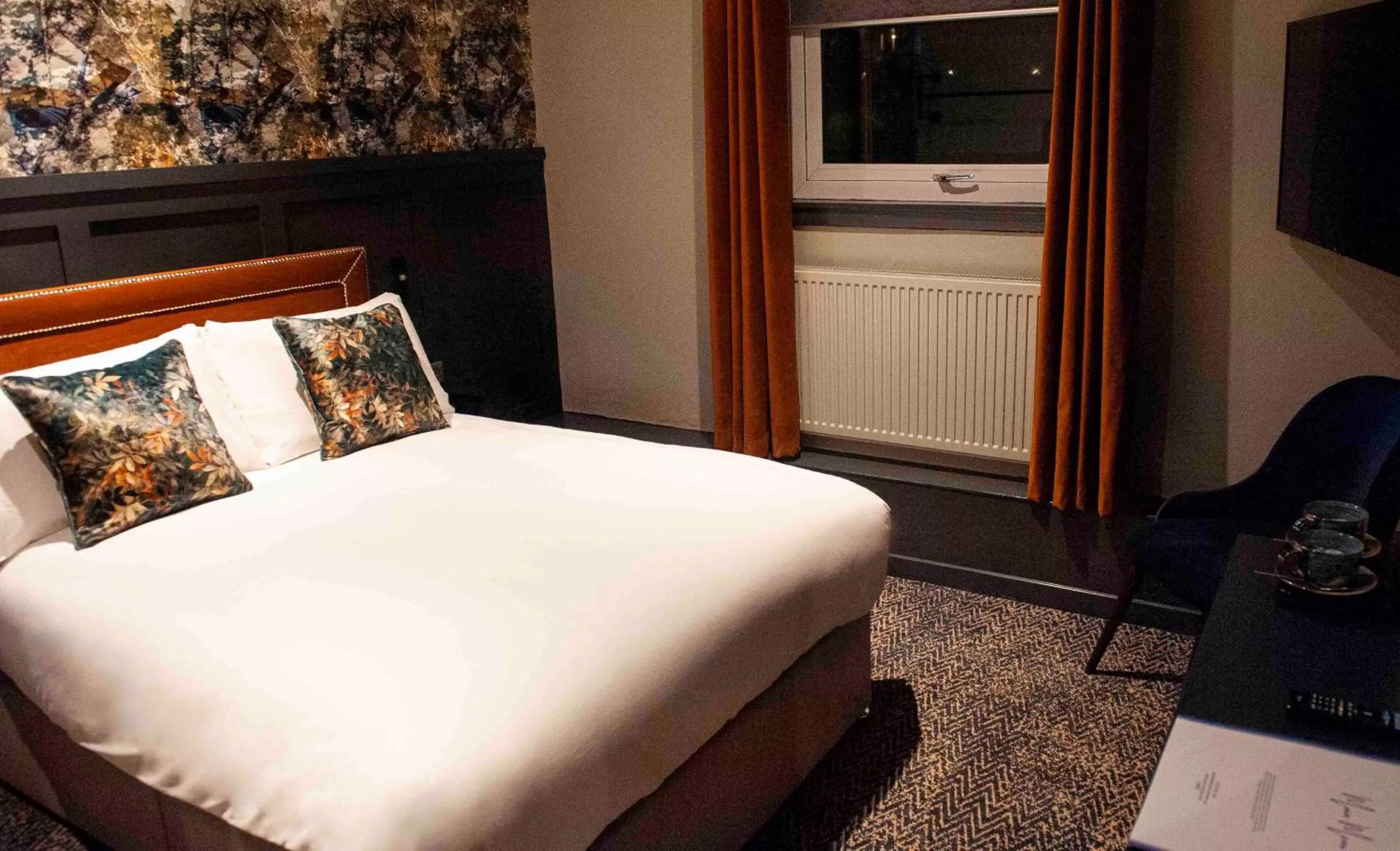 Bed in The Coachman Hotel