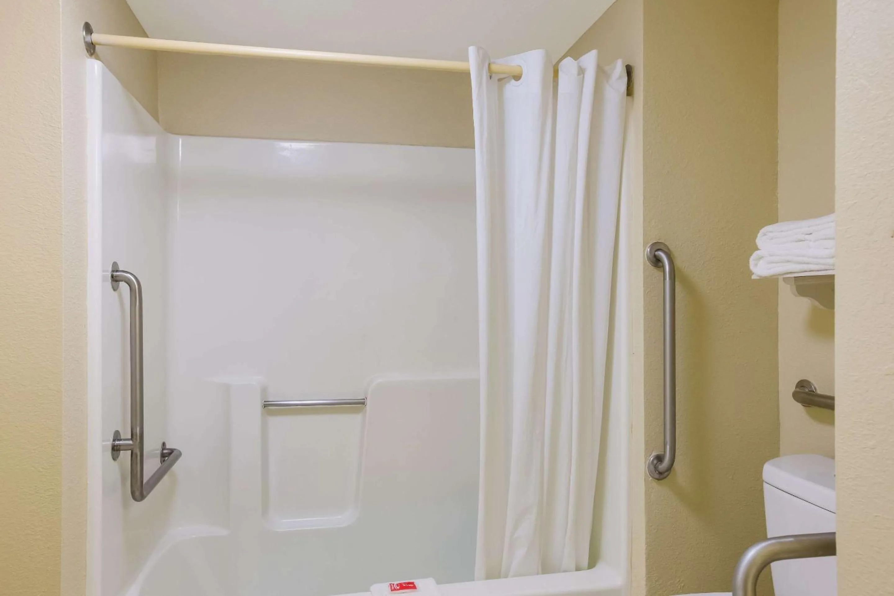 King Room - Disability Access/ Roll In Shower, 1st Floor - Non Smoking in Econo Lodge