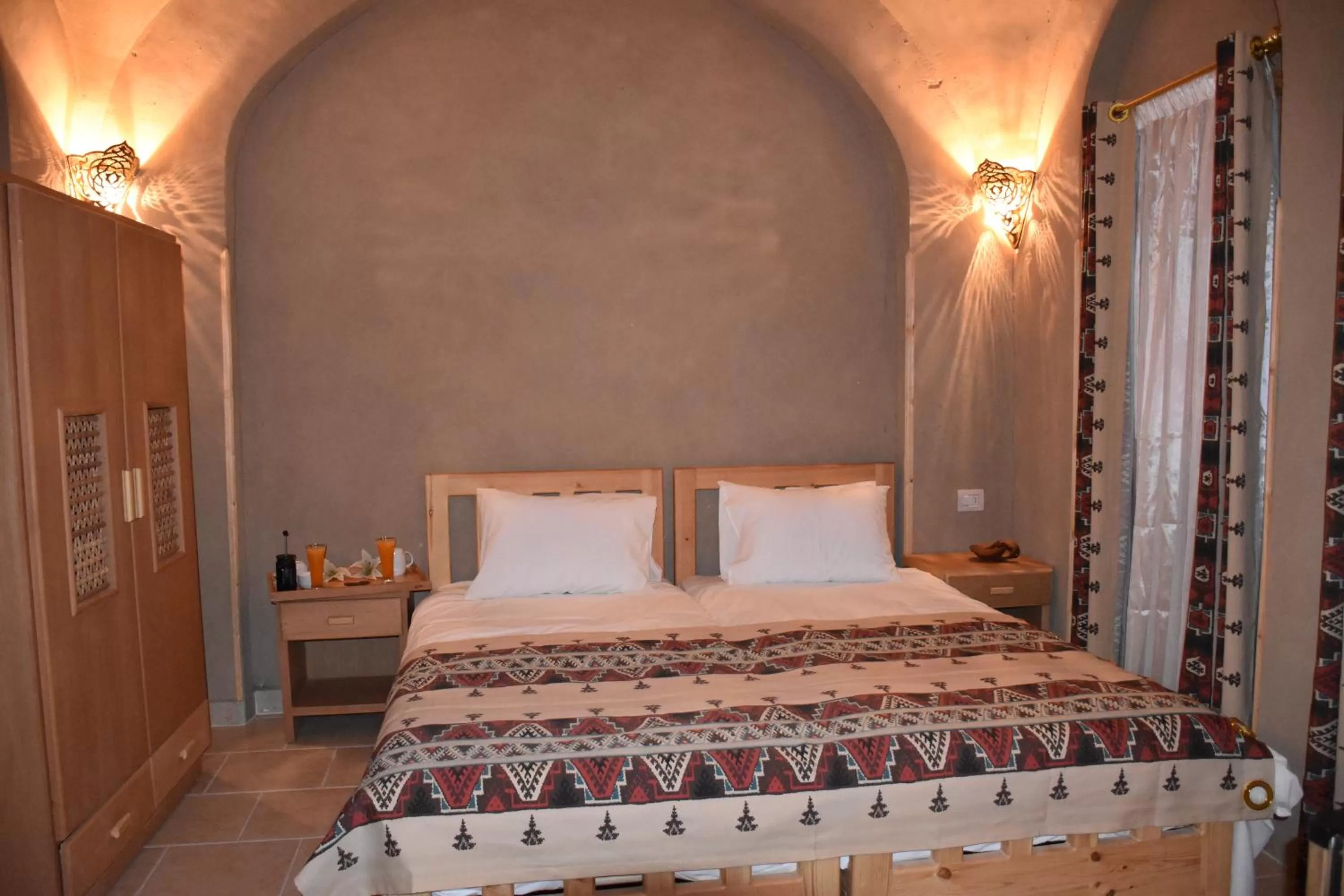 Bed in Embrace Hotel