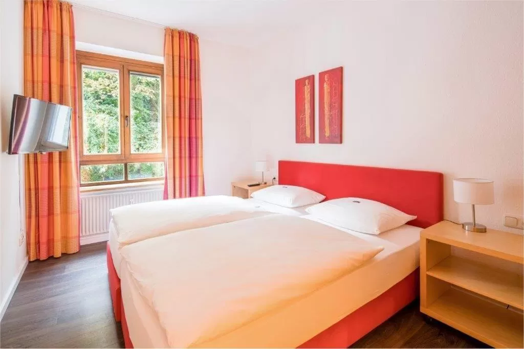 Bedroom, Bed in Hotel Am Nockherberg