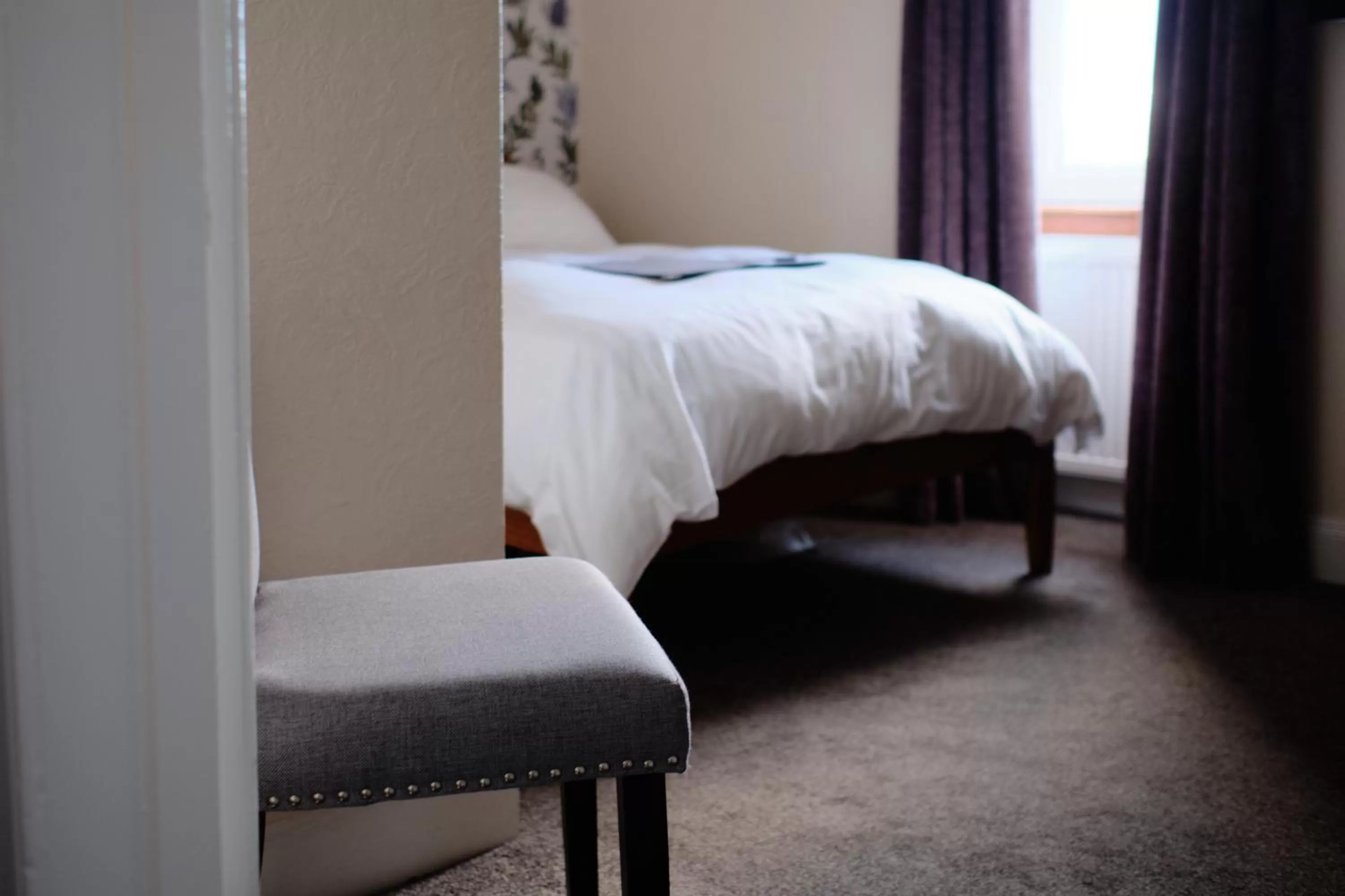 Bed in Ravenswood Guest House