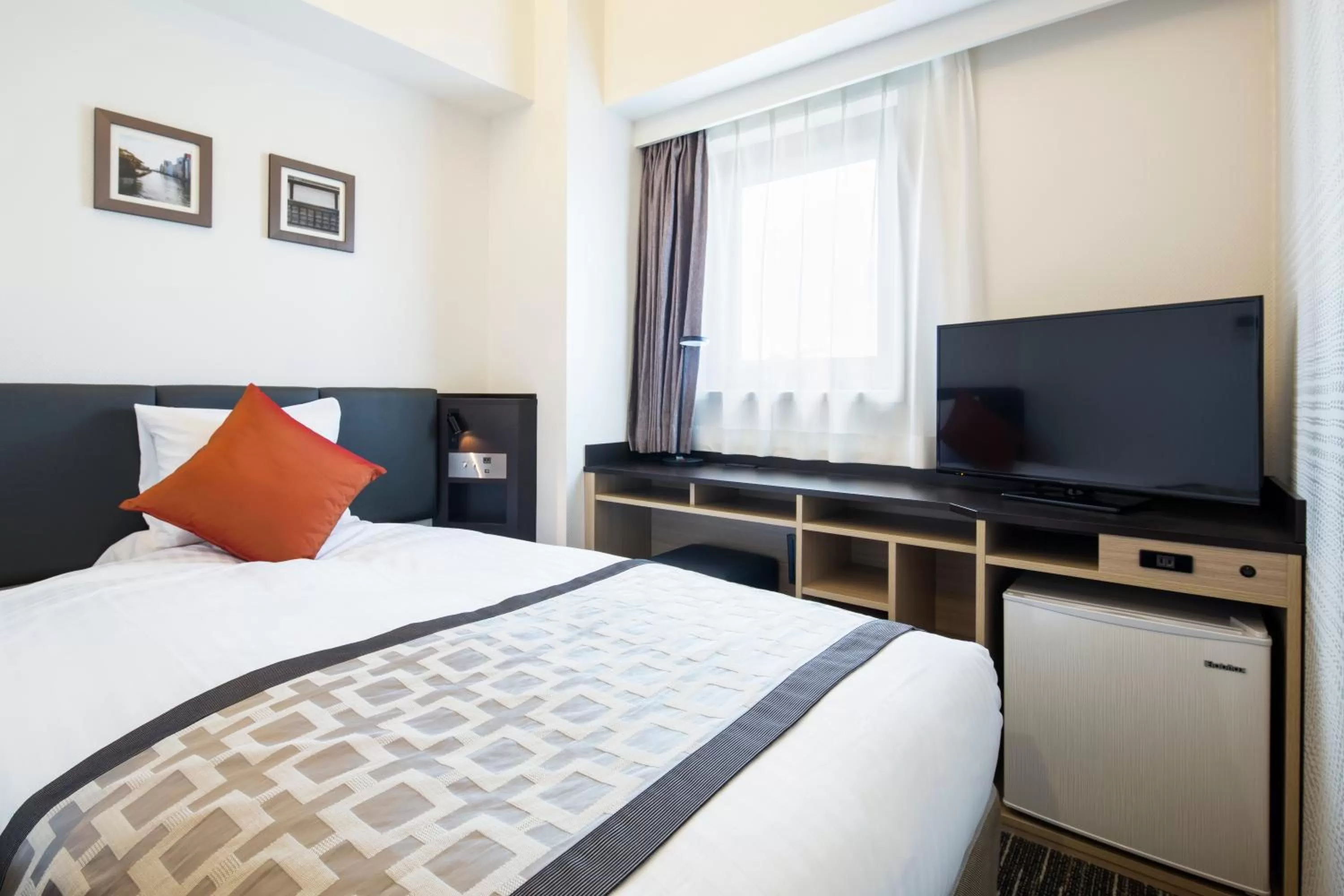 Photo of the whole room, Bed in HOTEL MYSTAYS Shin Osaka Conference Center