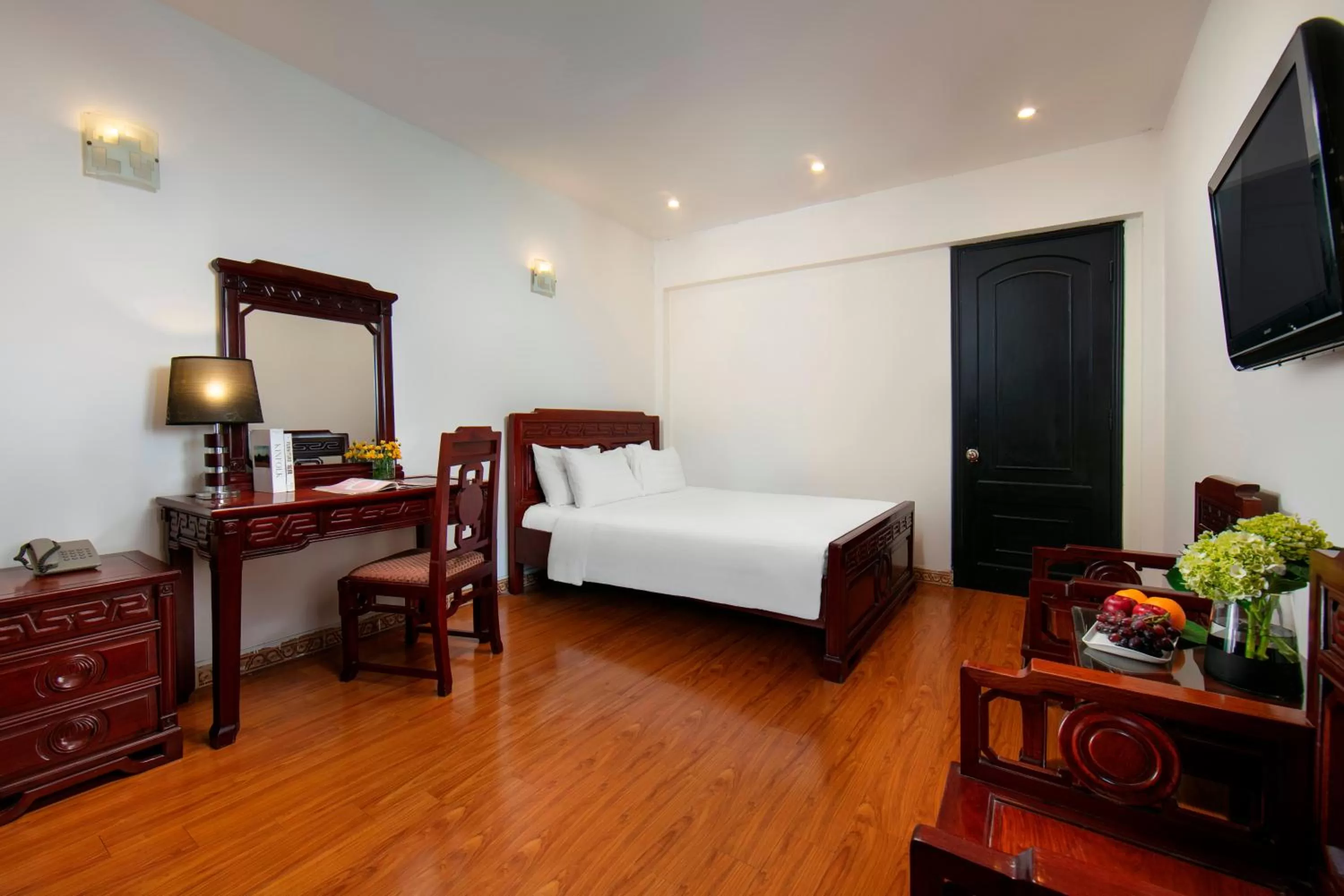 Bed in Bonjour Hanoi Hotel & Travel