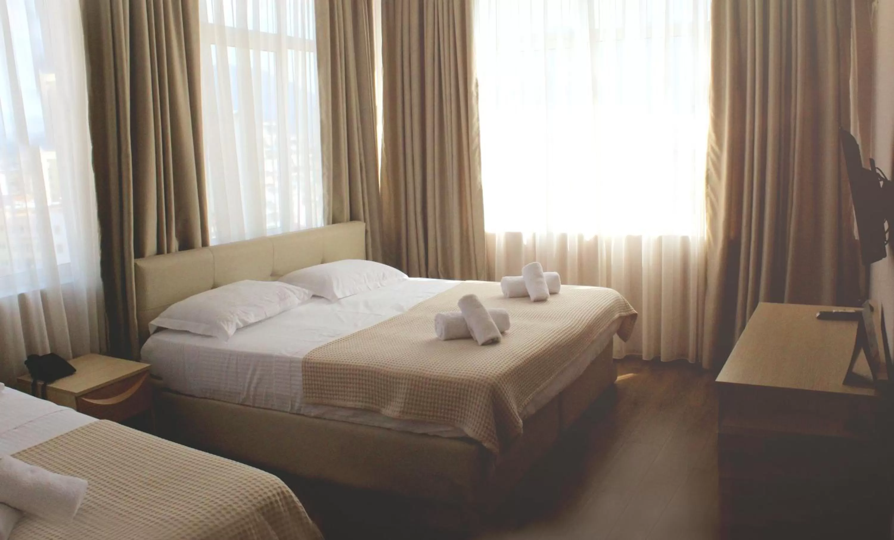 Bed in Signature Idea hotel