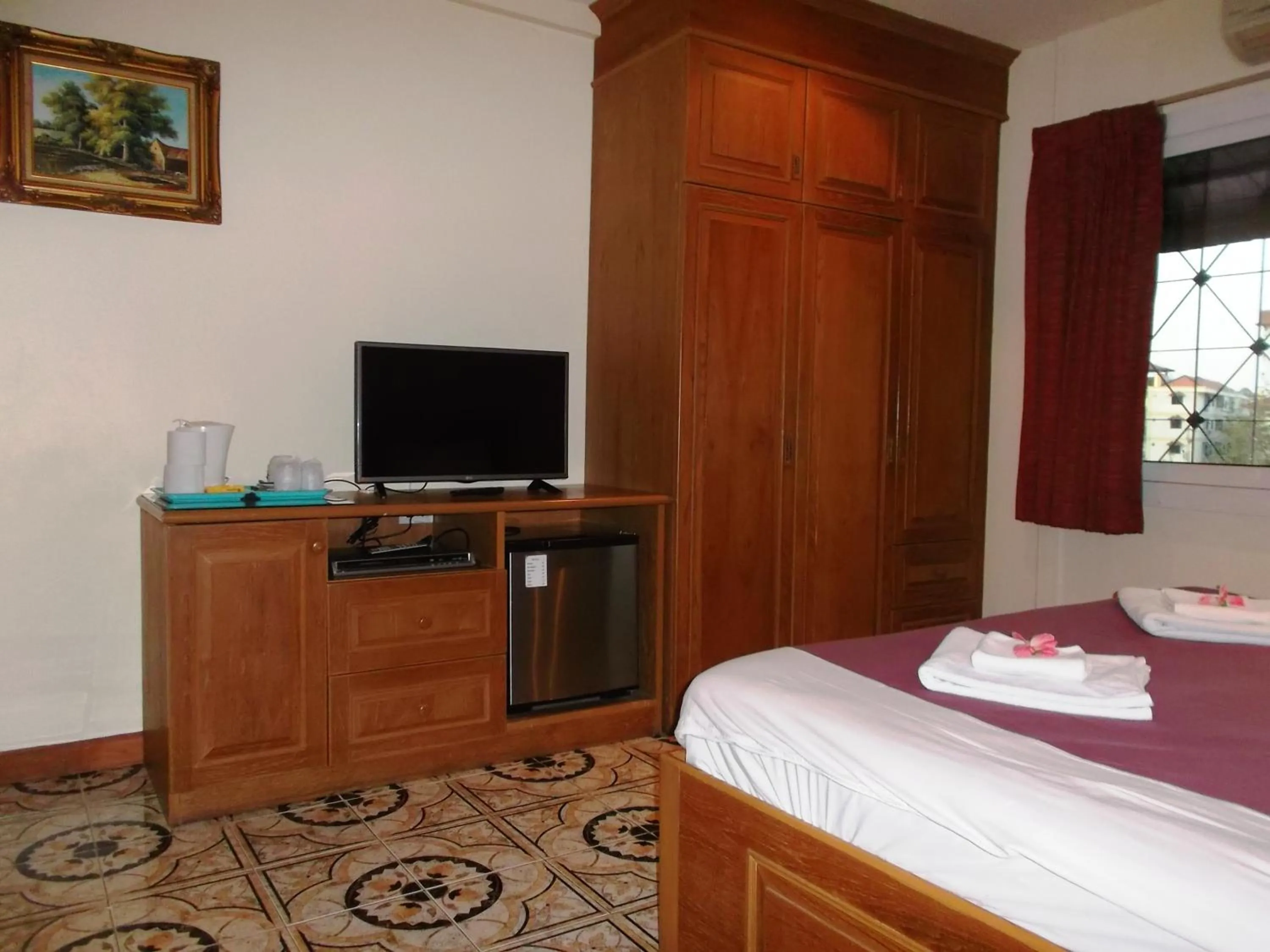 Decorative detail, Bed in Chaiyapoon Inn