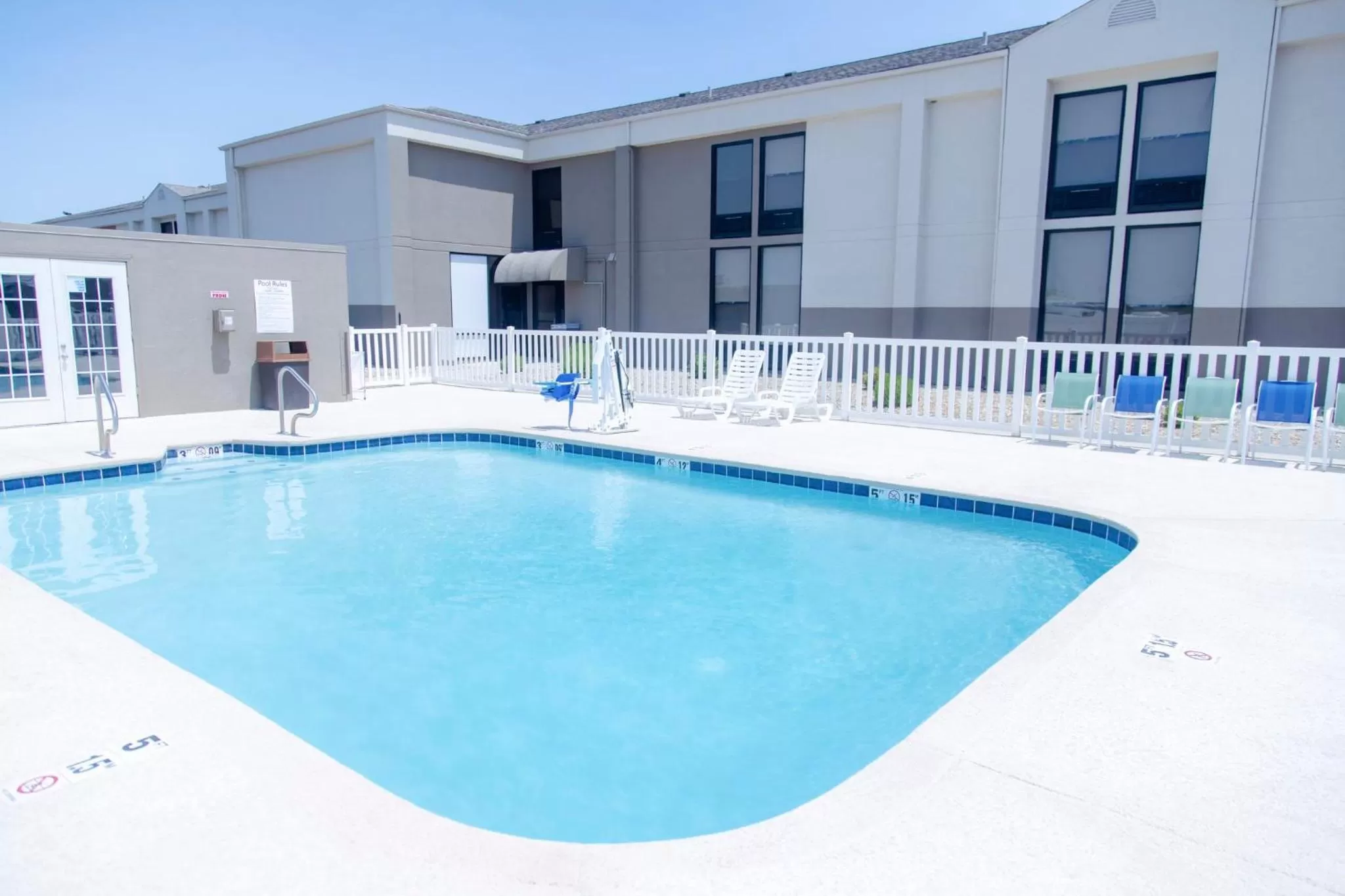 Swimming pool in Holiday Inn Express Marshfield - Springfield Area by IHG