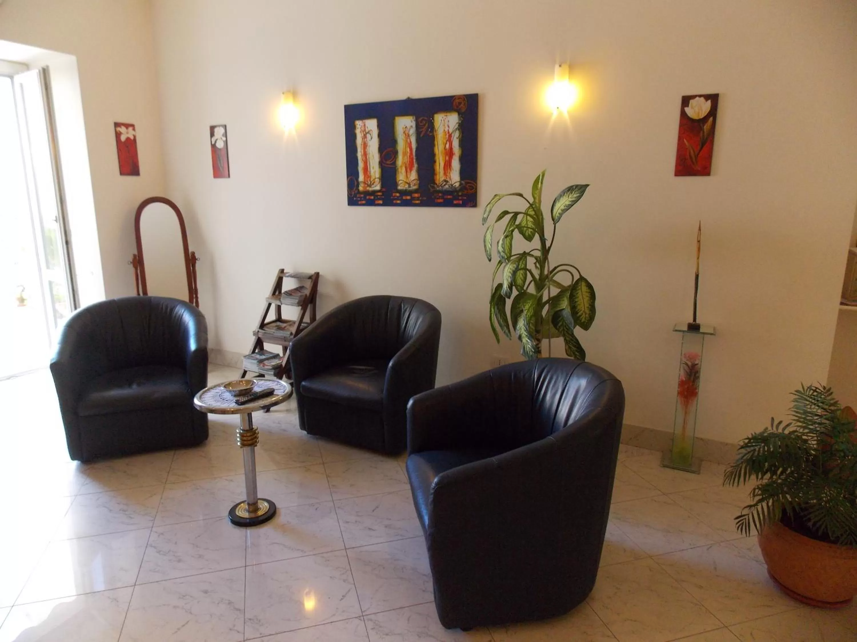 Communal lounge/ TV room in Albergo Roma