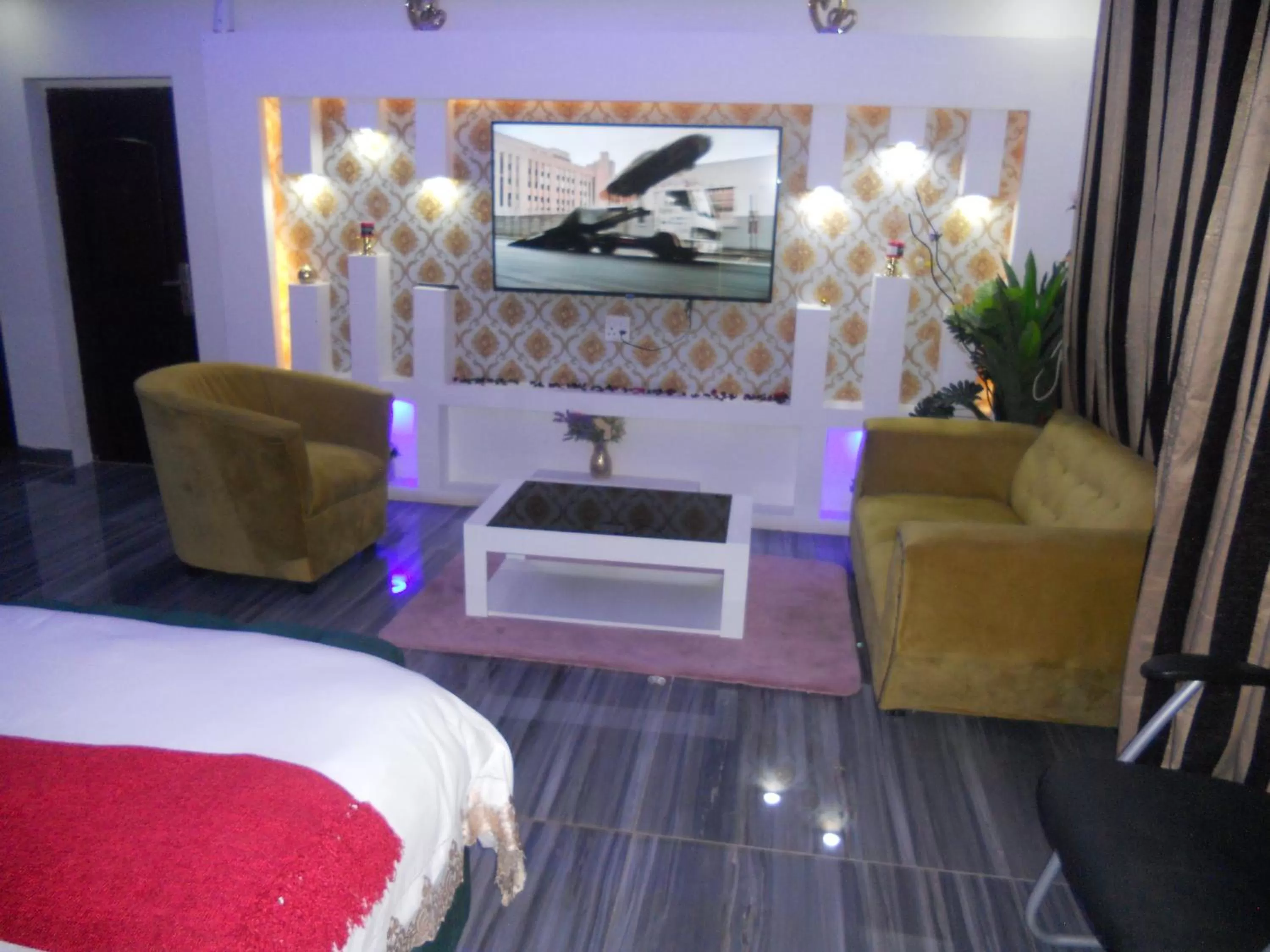 Communal lounge/ TV room in Gold Crown International Hotel Johannesburg