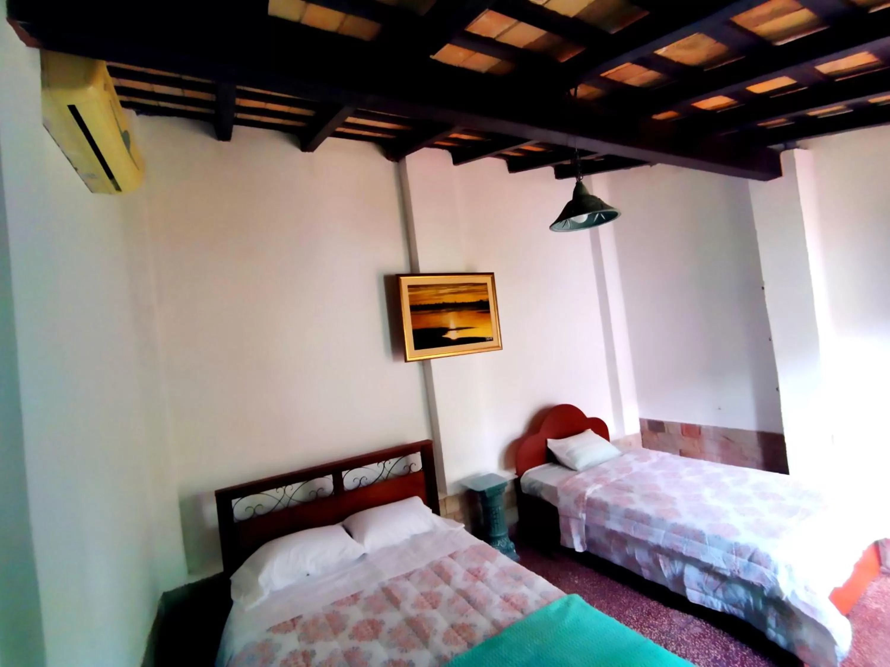 Bed in Hotel La Aparesida