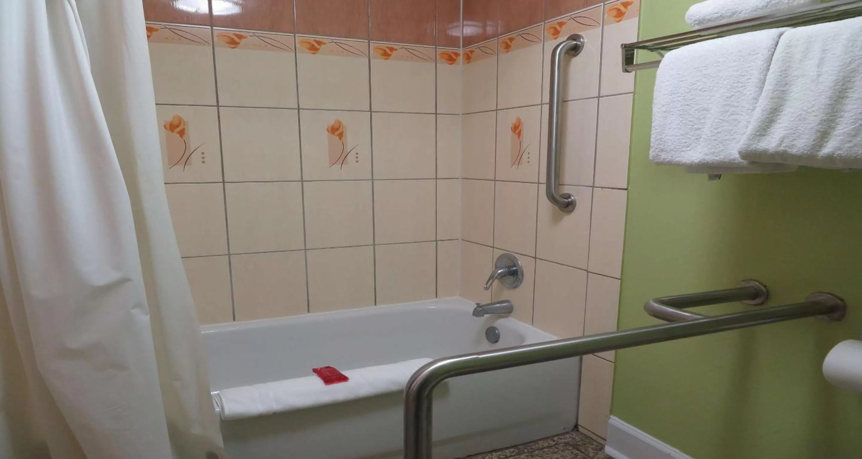 Bathroom in SureStay Plus Hotel by Best Western St Marys Cumberland