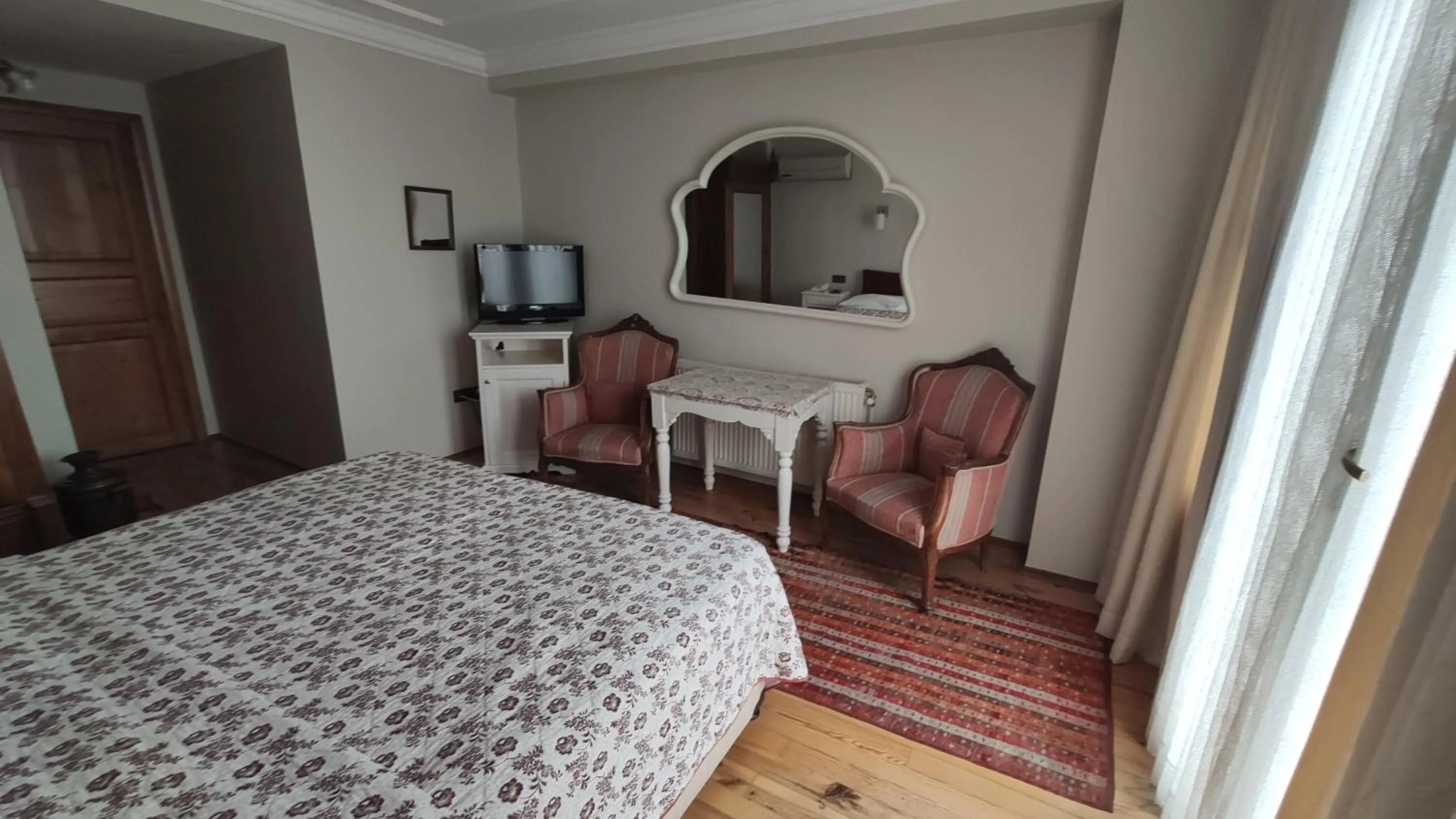 Seating area, Bed in Turkoman Hotel