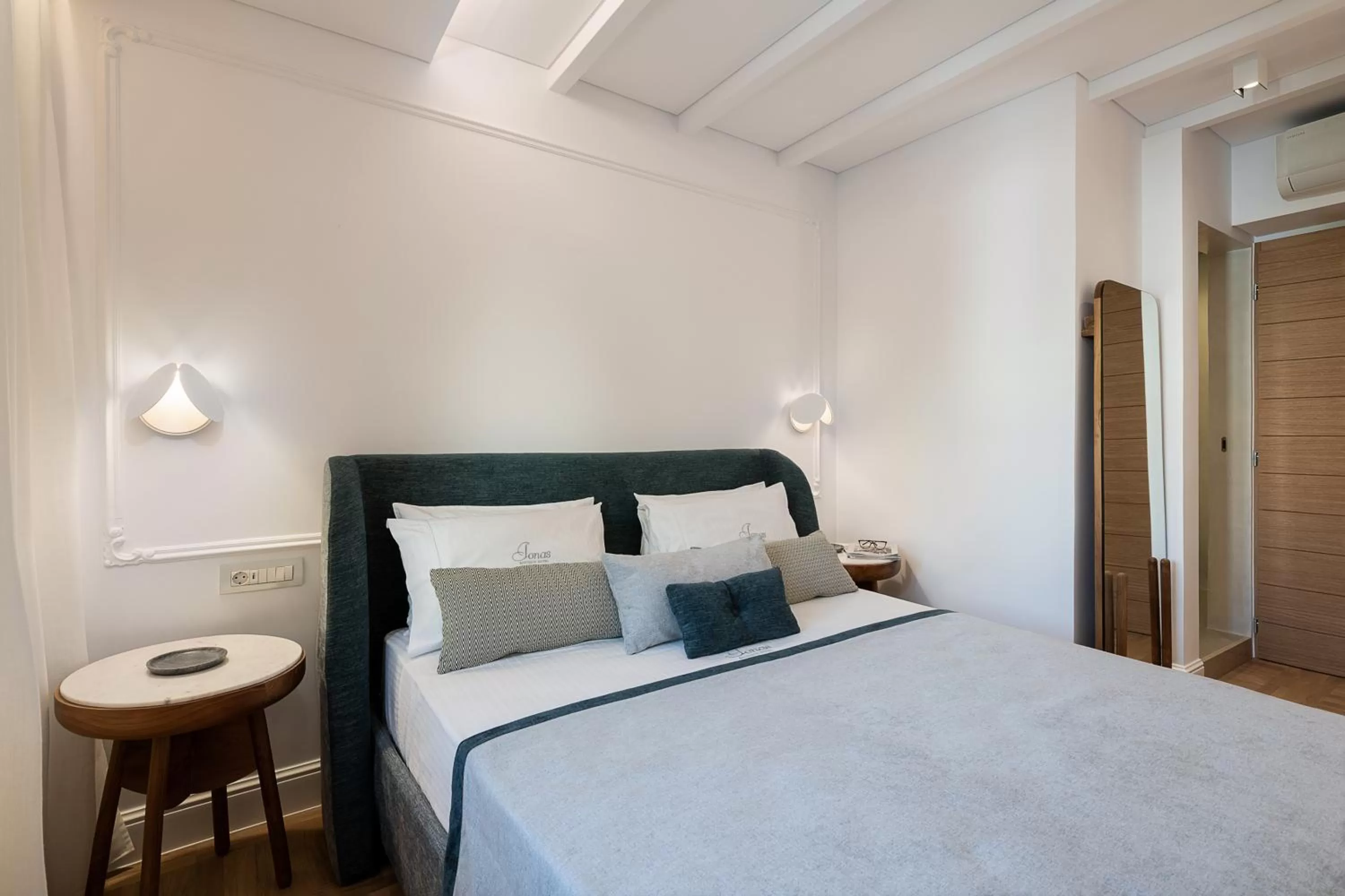 Bed in Ionas Boutique Hotel