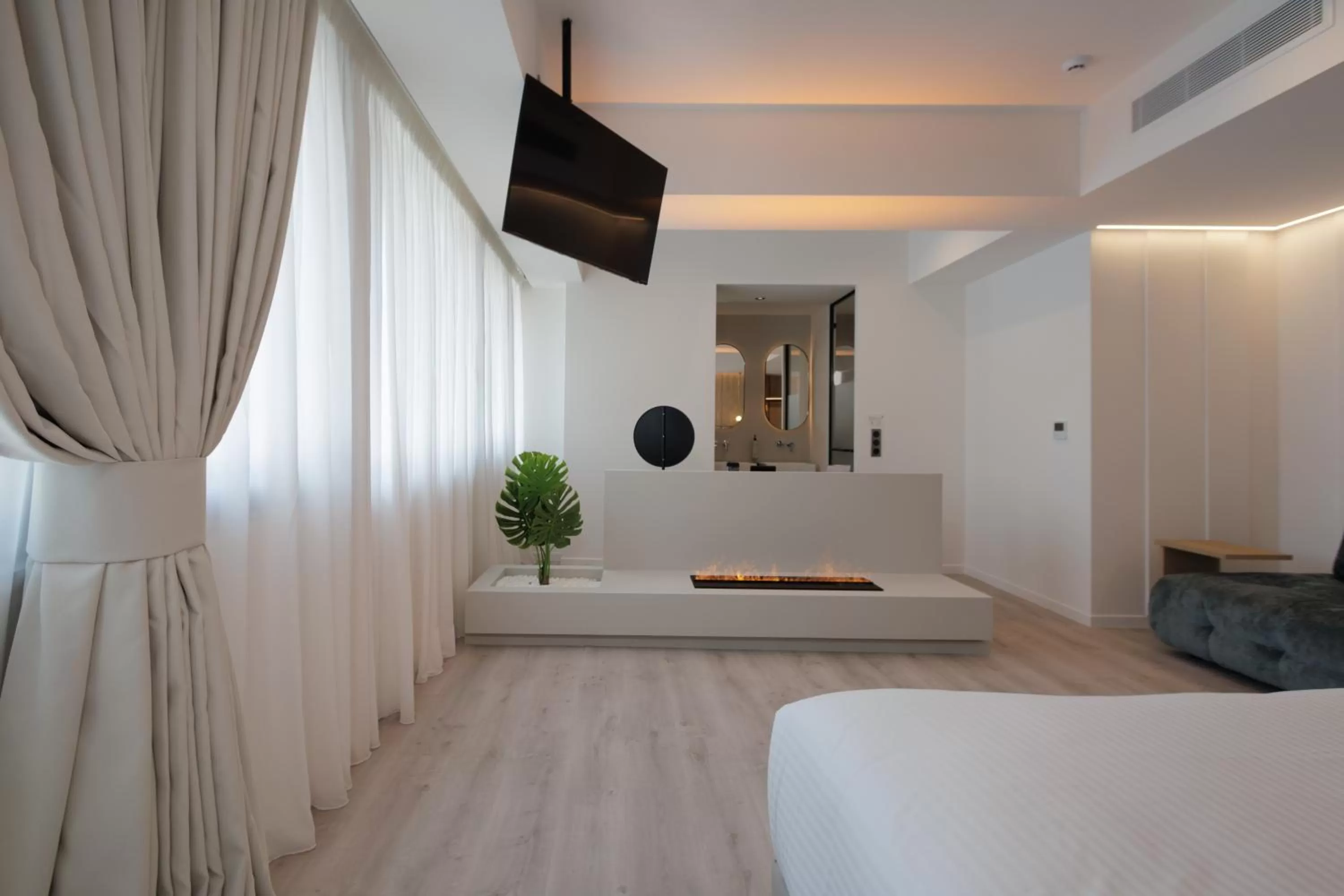 Living room, TV/Entertainment Center in LUX&EASY Signature Syngrou 234