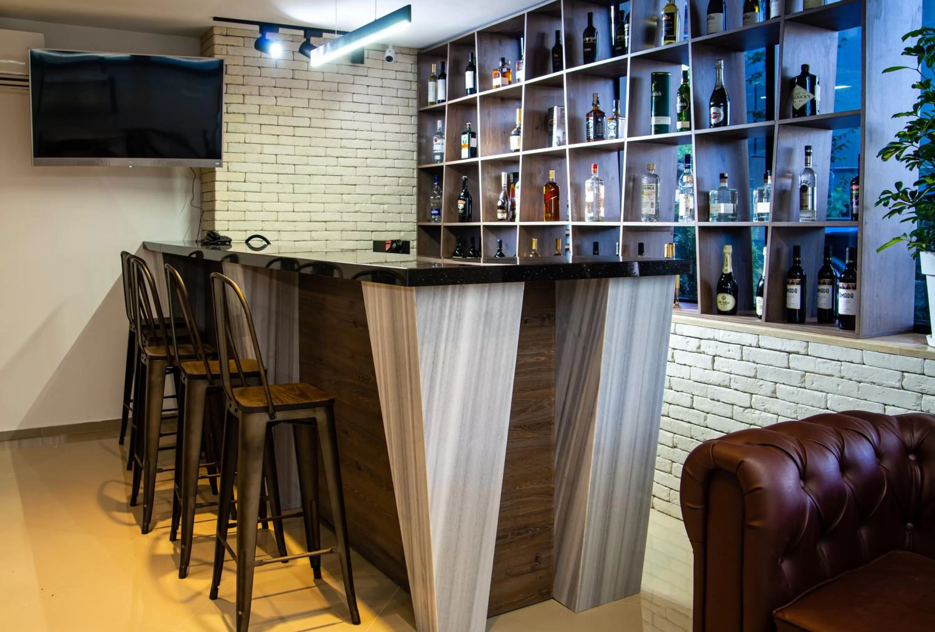 Communal lounge/ TV room in BG Palace Hotel