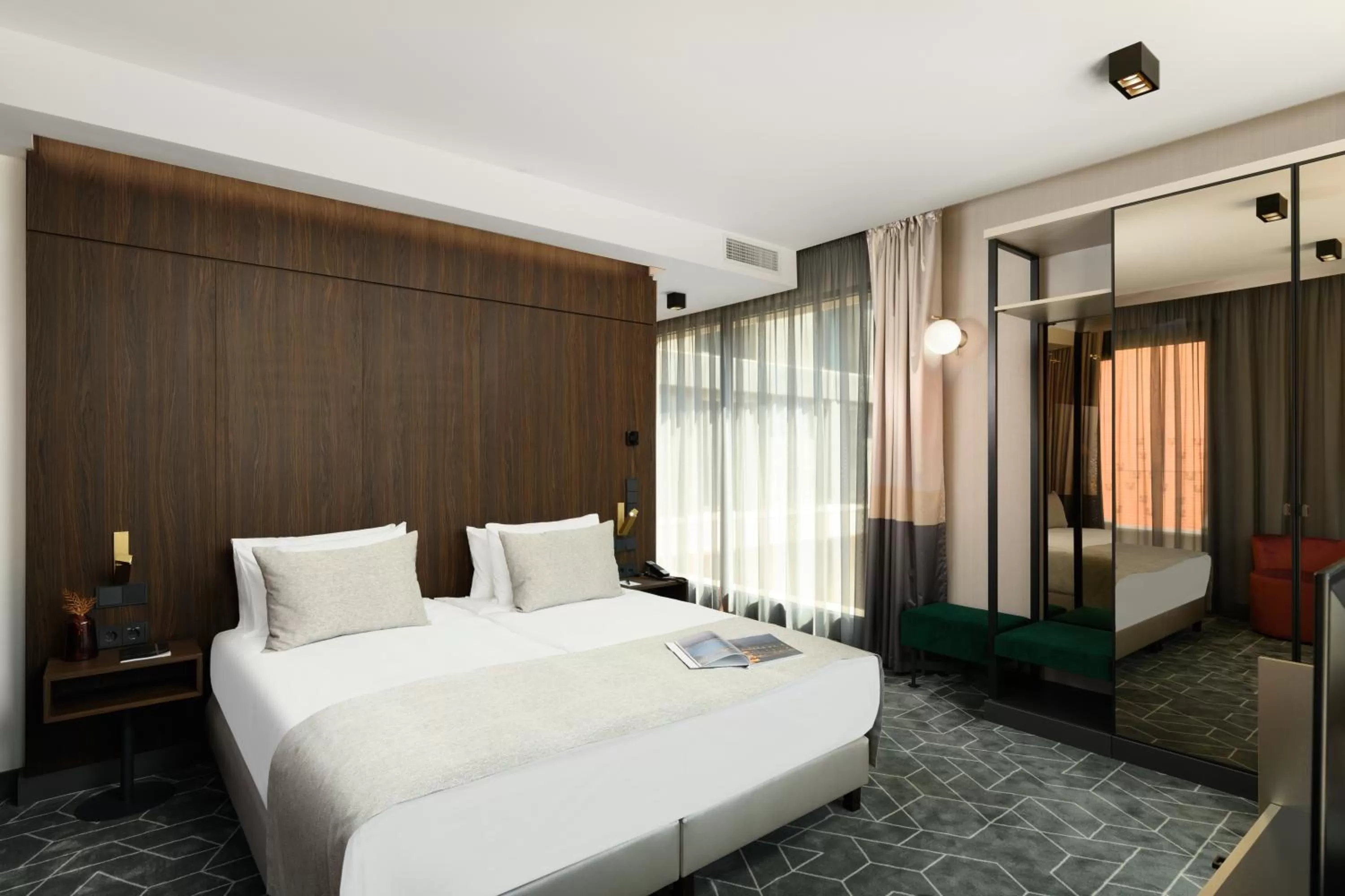 Photo of the whole room, Bed in Emerald Hotel by Continental Group
