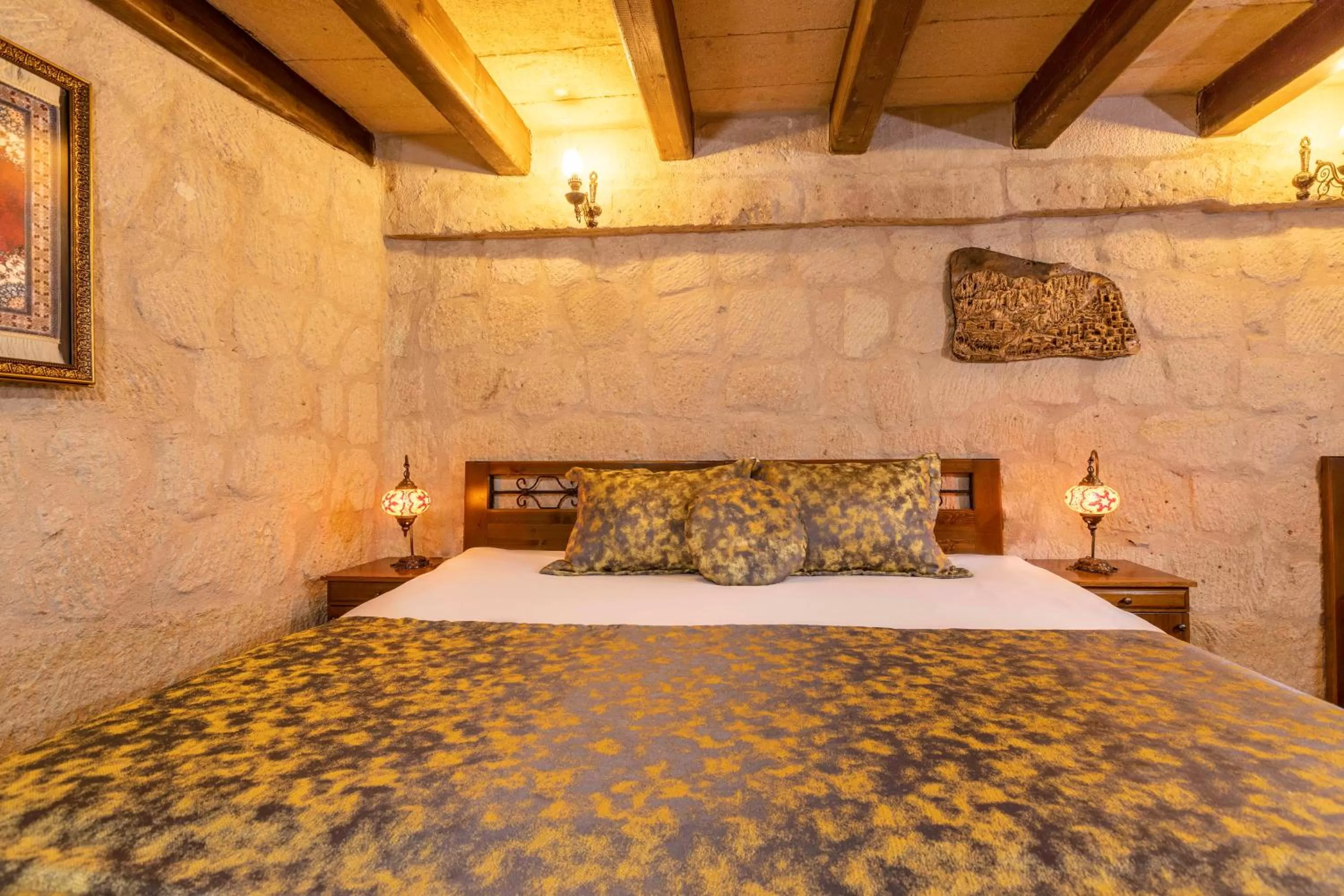 Bed in Adora Cave Suites -