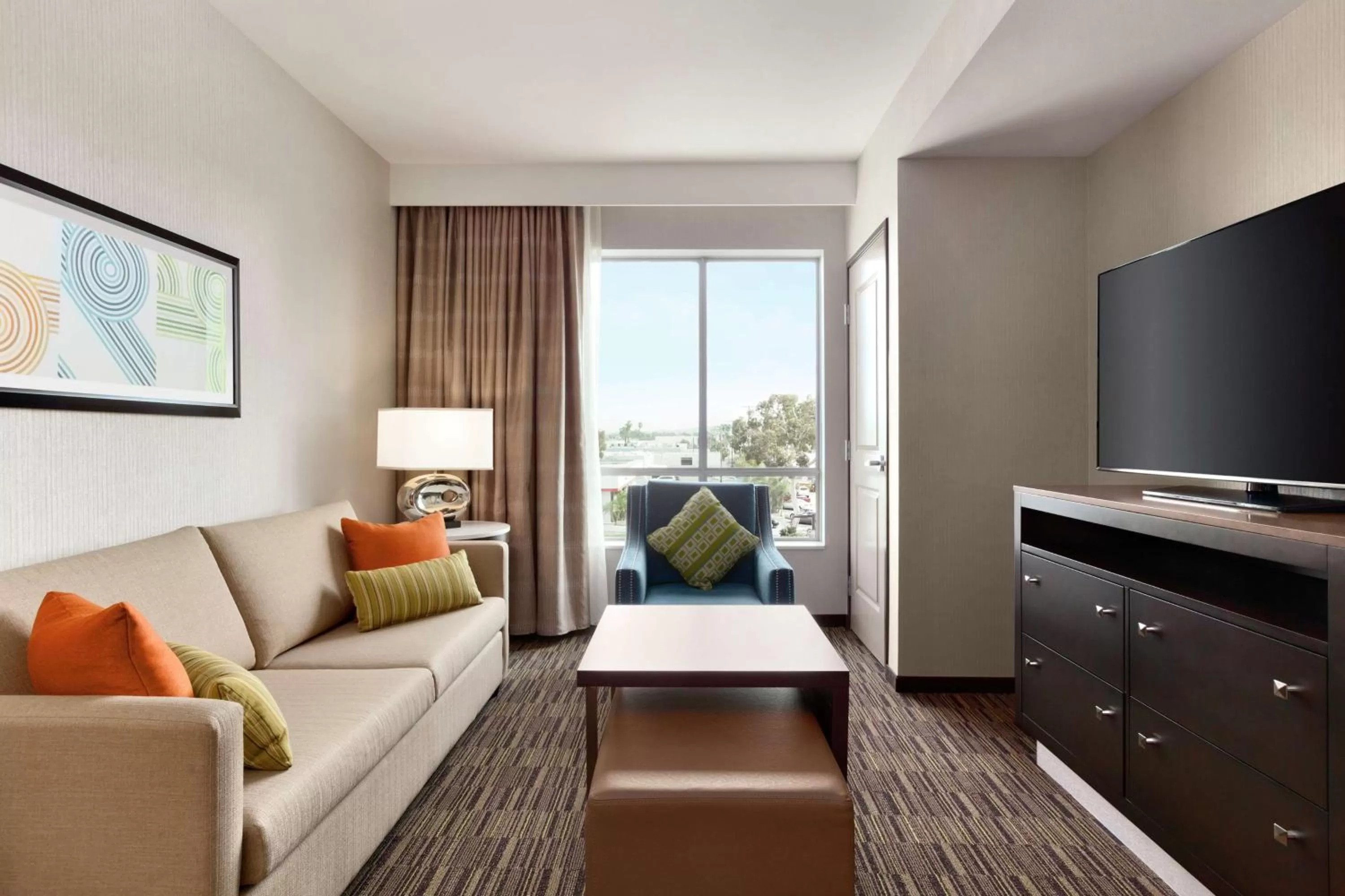 Living room in Homewood Suites By Hilton Irvine John Wayne Airport