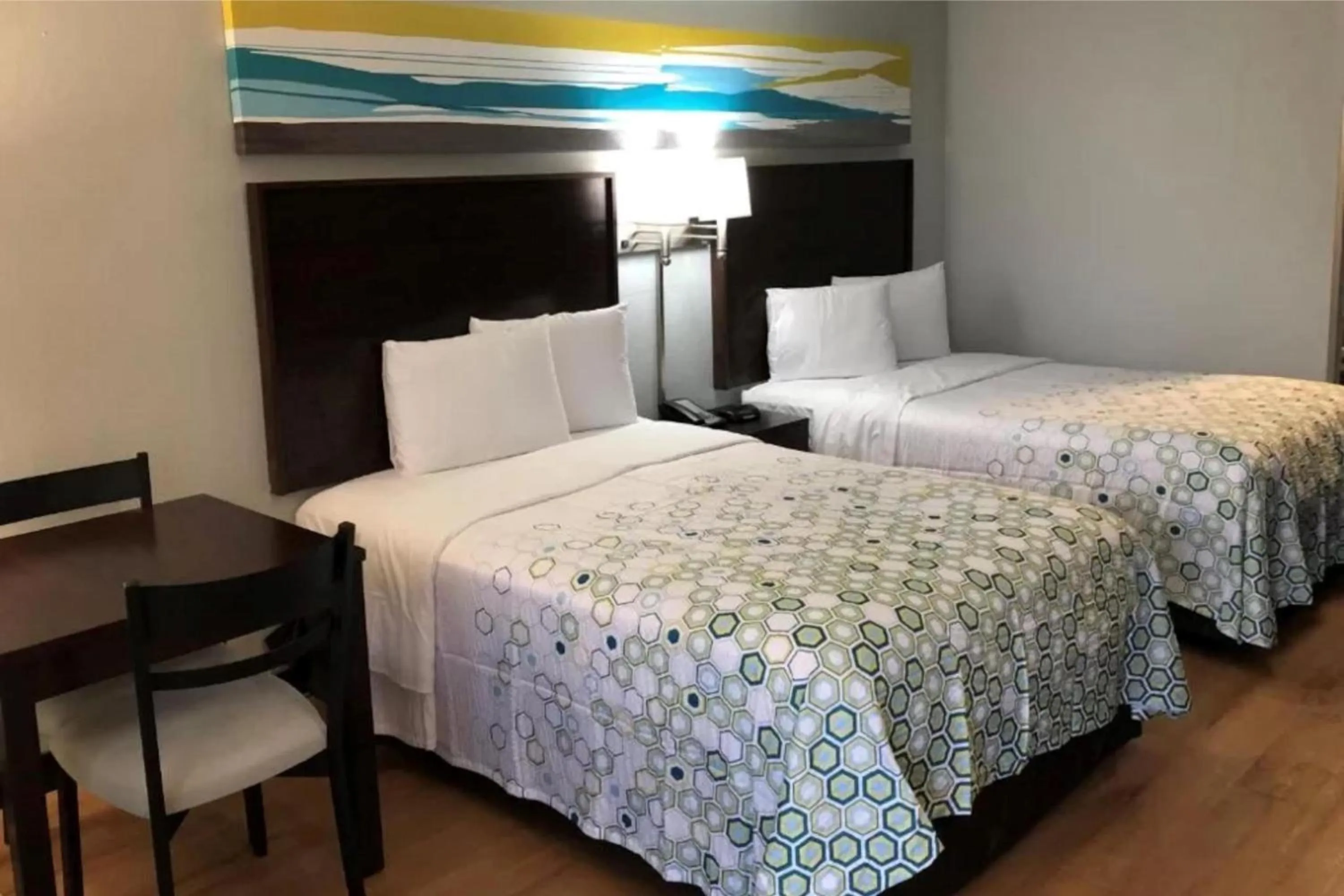 Photo of the whole room, Bed in HomeTowne Studios by Red Roof Augusta