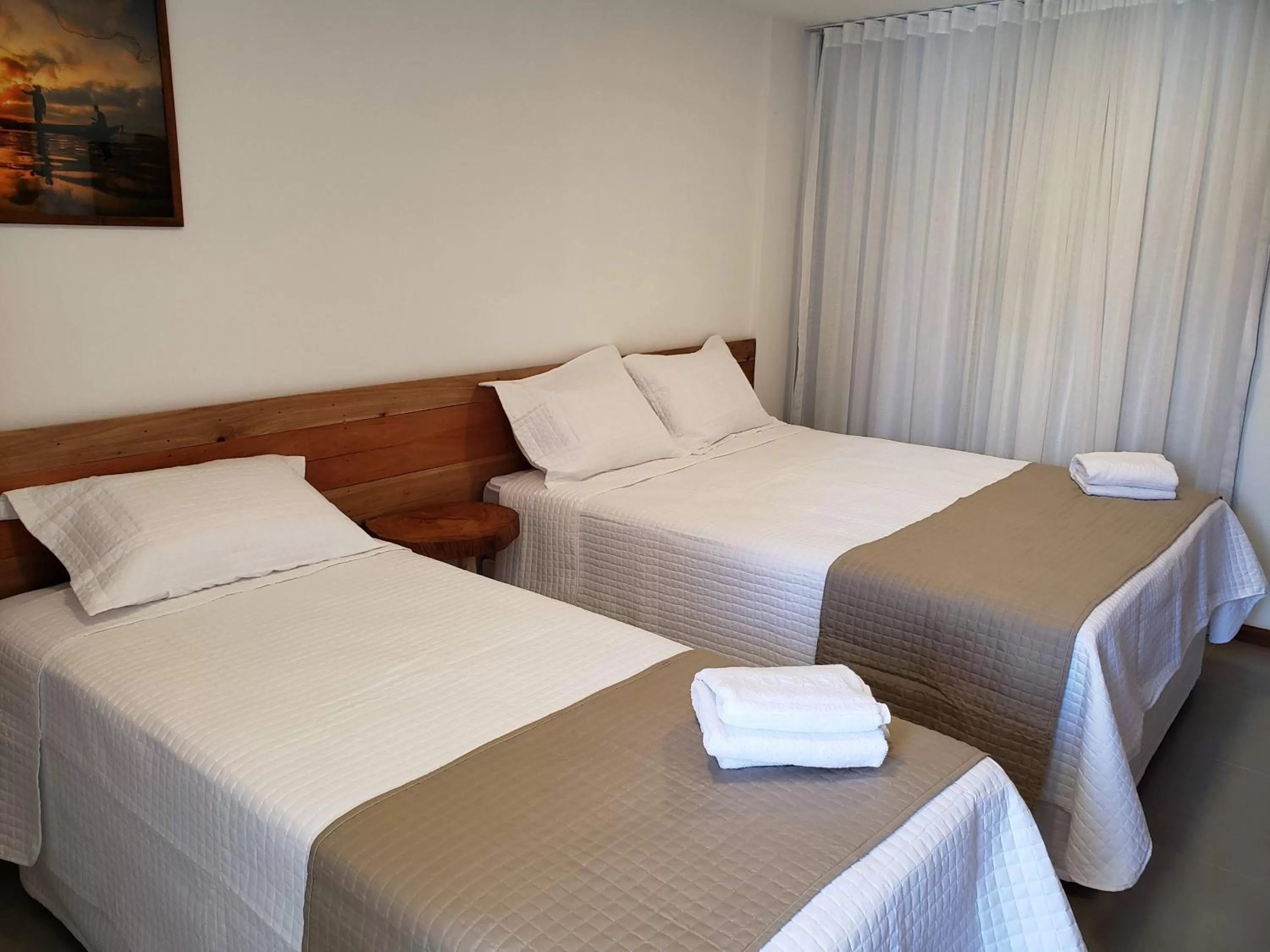 Bed in Pousada Ricoco