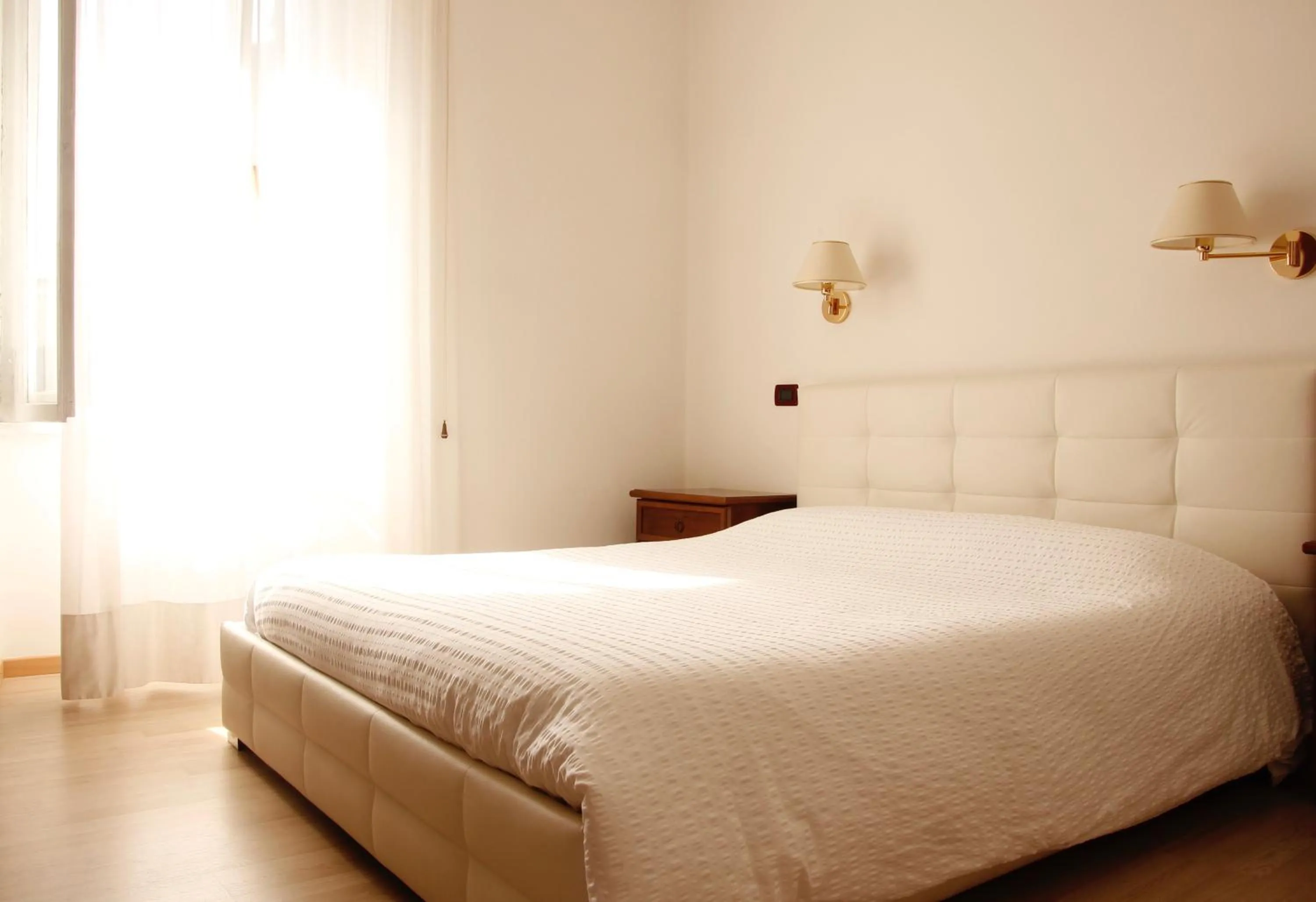 Bed in Hotel Venezia