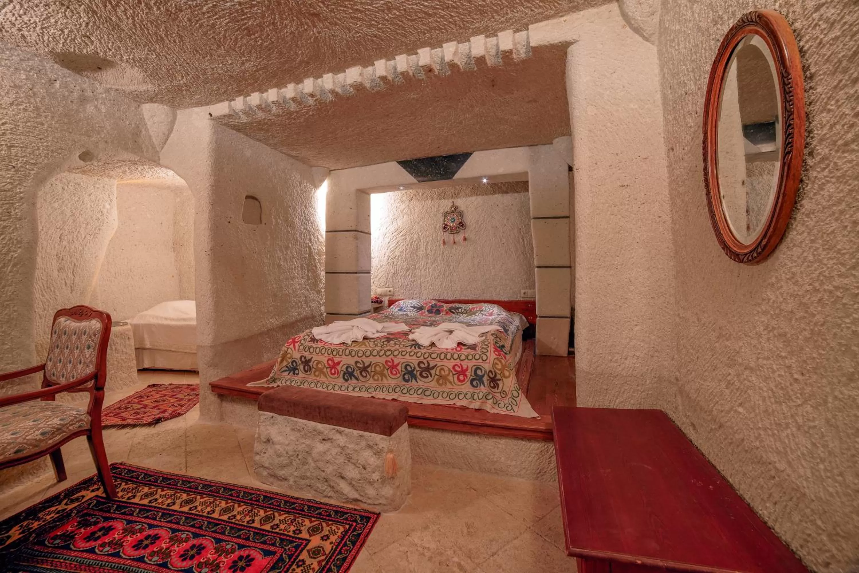 Photo of the whole room, Bed in Local Cave House