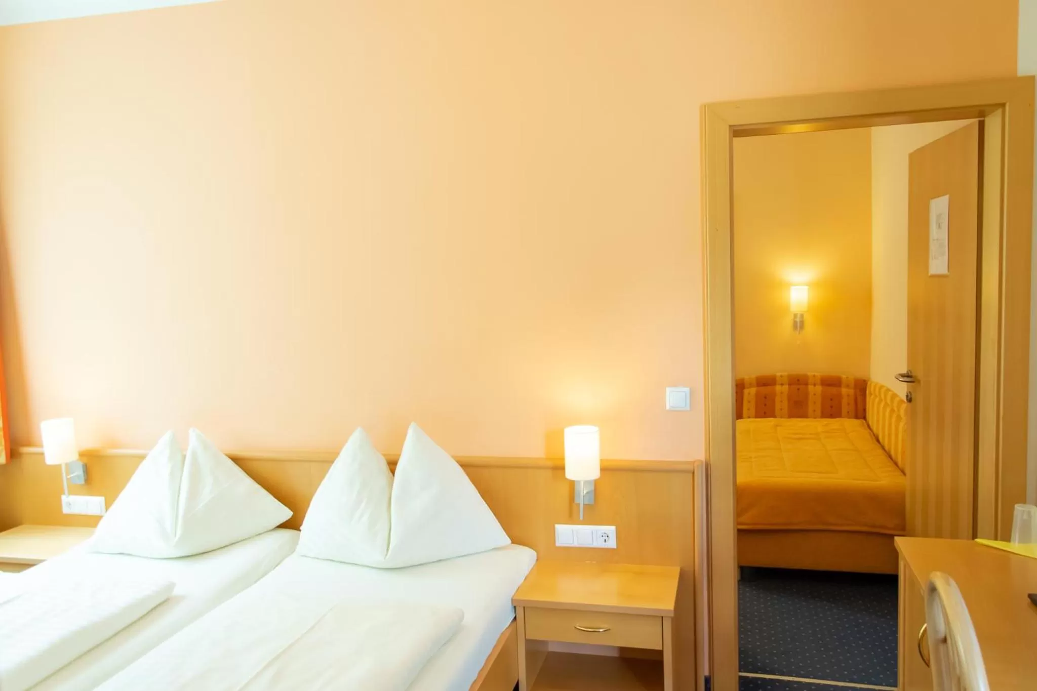 Bed in Strandhotel Burgstaller